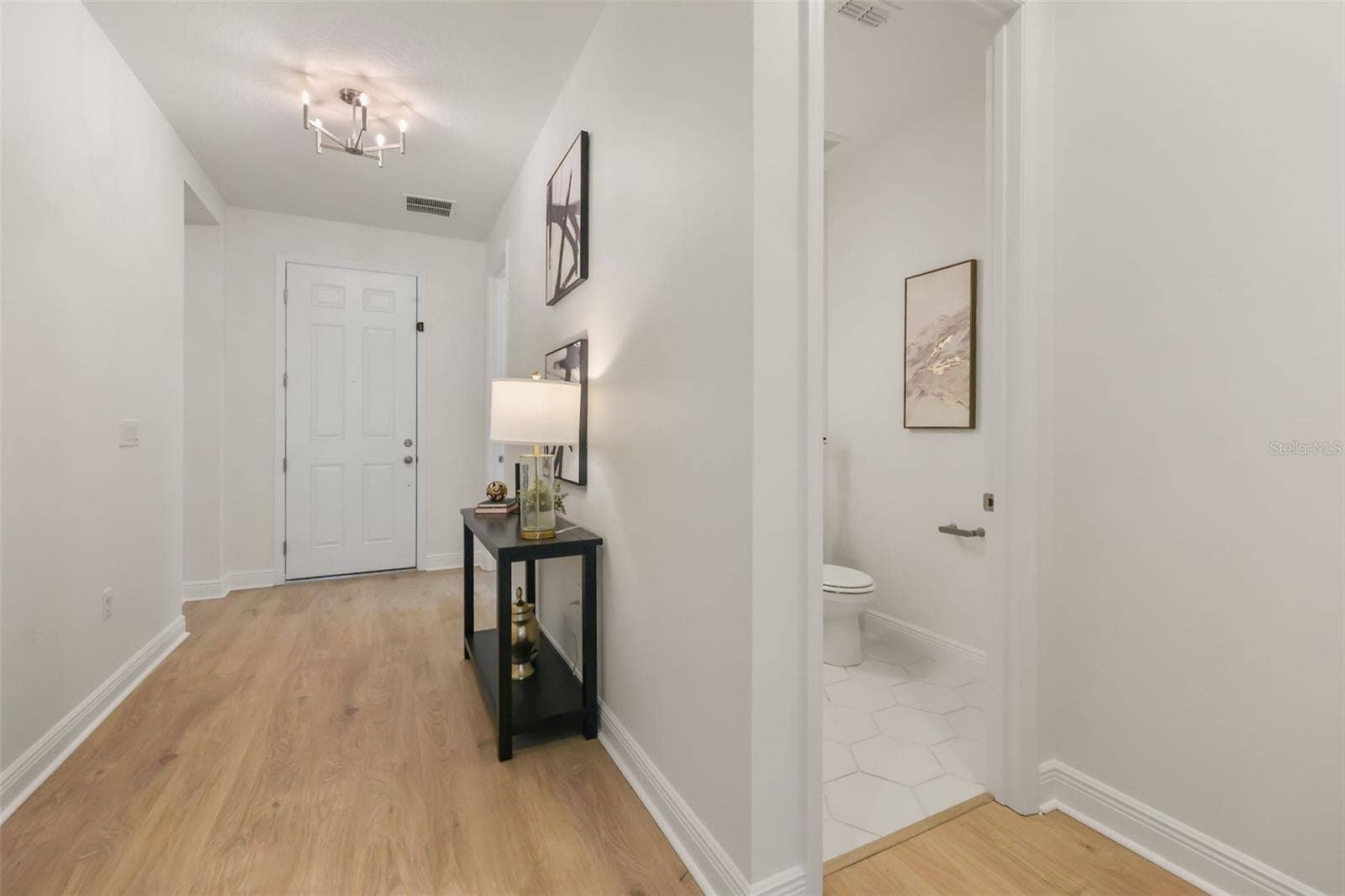 14360 CREST PALM AVENUE, Windermere, FL 34786 Front hallway half bath