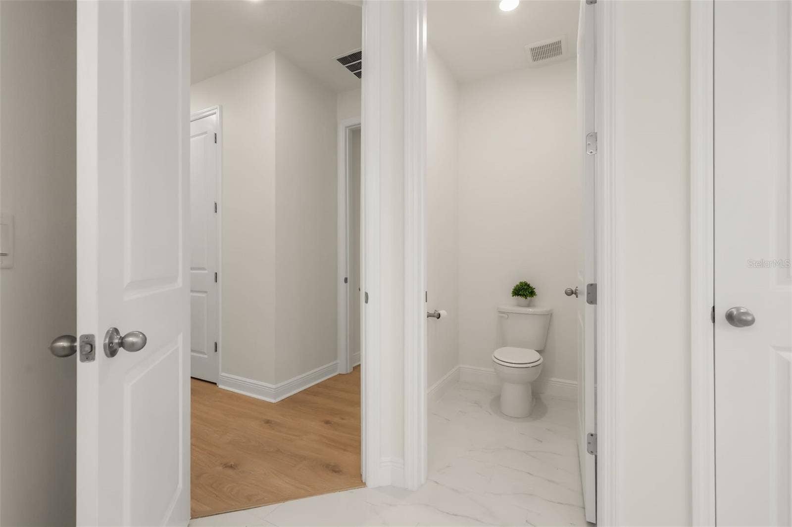 14360 CREST PALM AVENUE, Windermere, FL 34786 Luxurious primary bathroom with shower, dual vanity, soaker tub, and water closet
