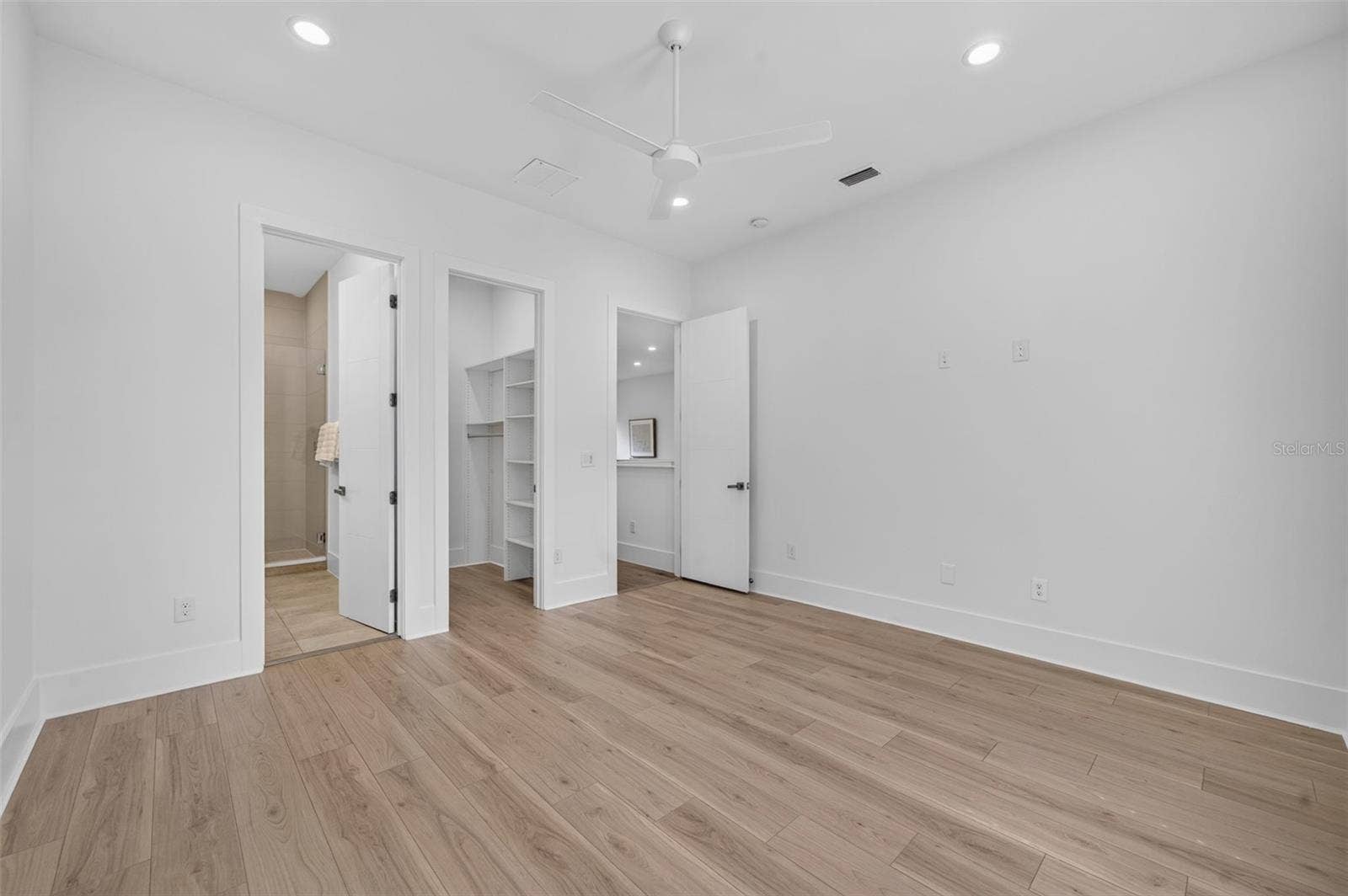Bedroom 2 with en-suite bath & walk-in closet