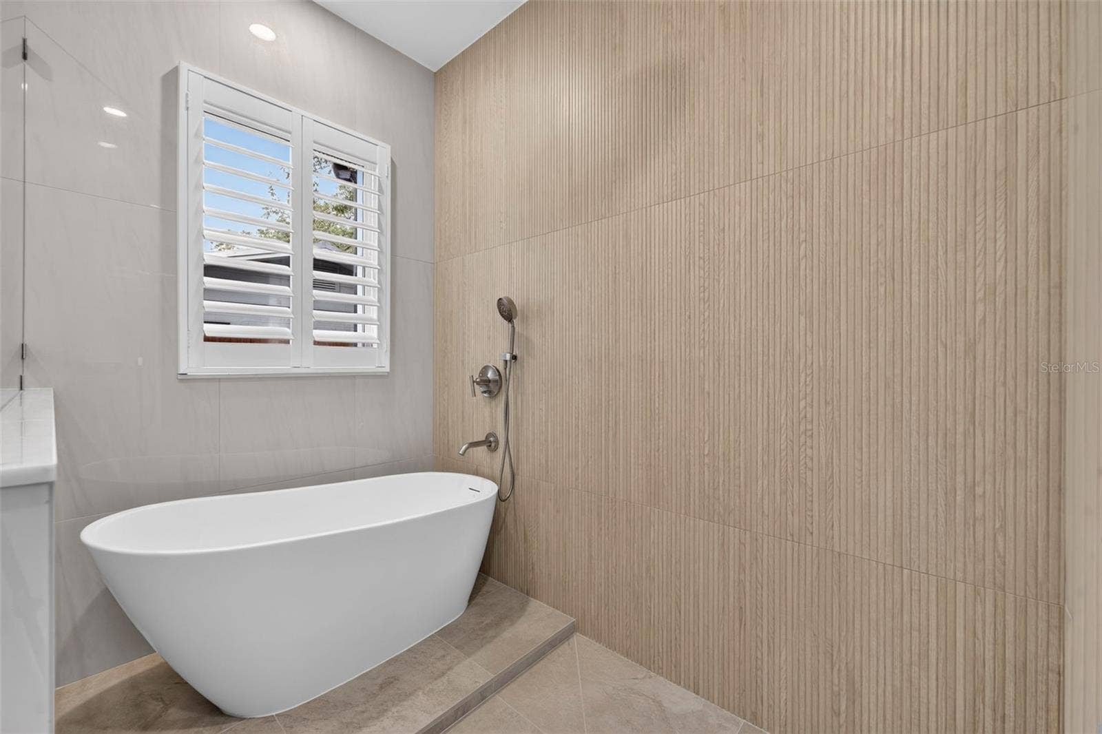 Walk-in shower with multiple showerheads & soaking tub
