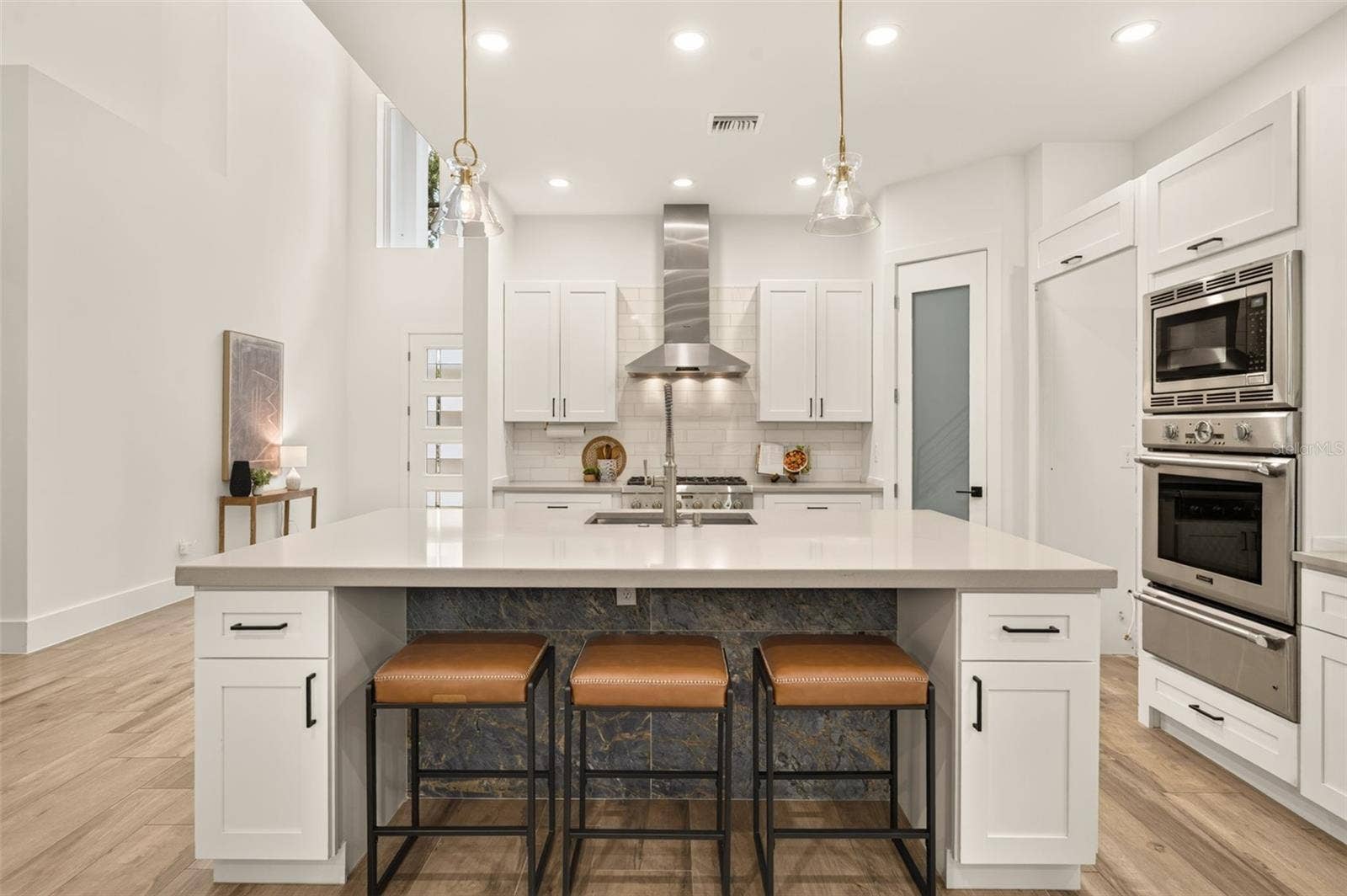 Large island w/ space for seating- overlooks dining/living area