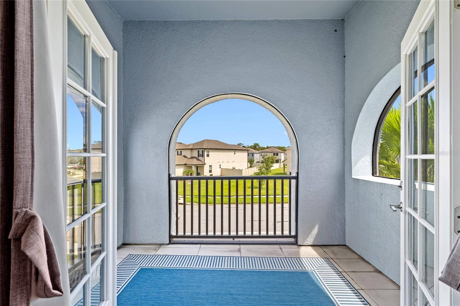 1168 PANDO LOOP, Orlando, FL 32824 Balcony, Primary Suite