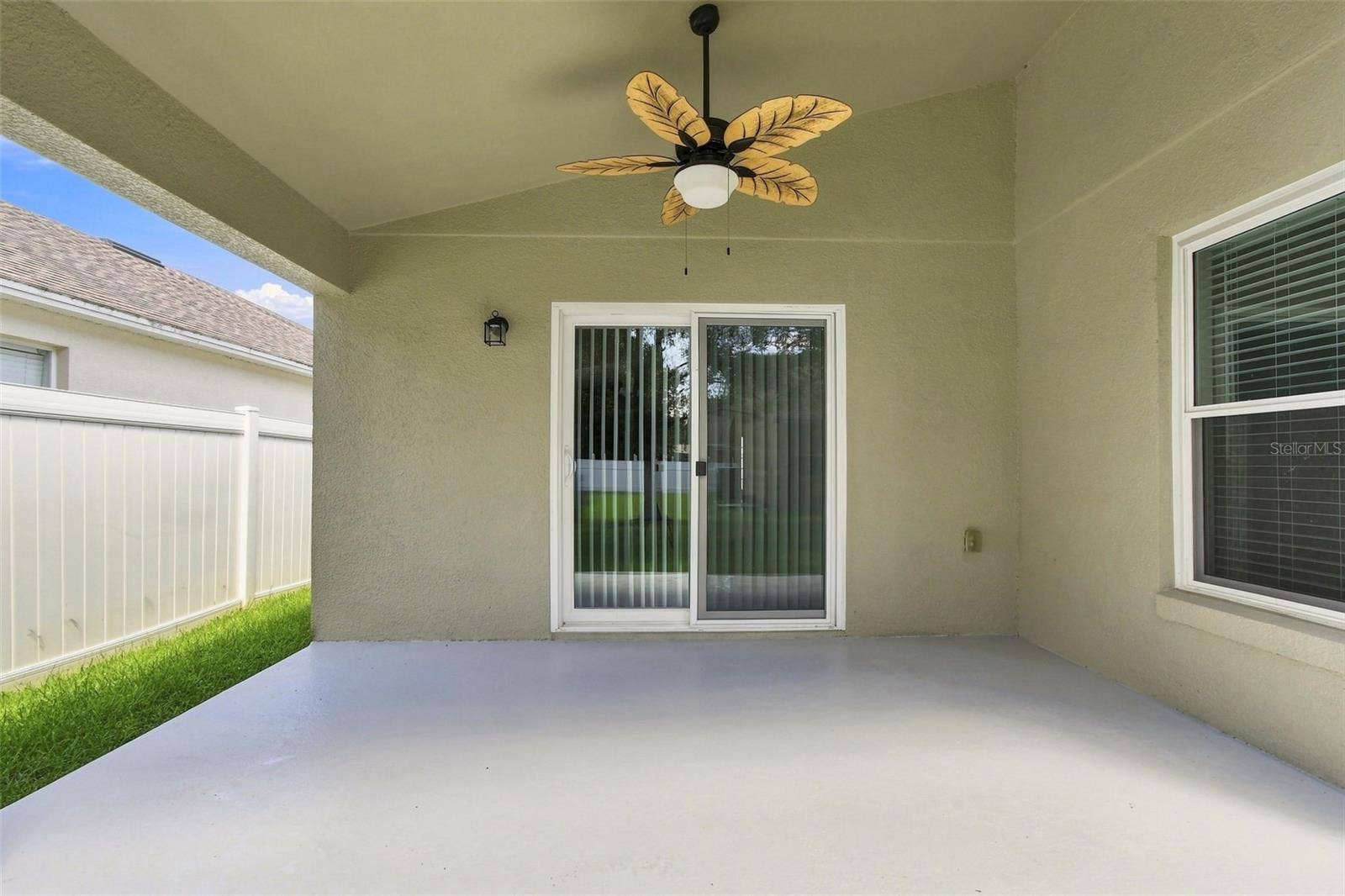 1174 BEECH GROVE WAY, Orlando, FL 32828 Covered Lanai with Ceiling Fan