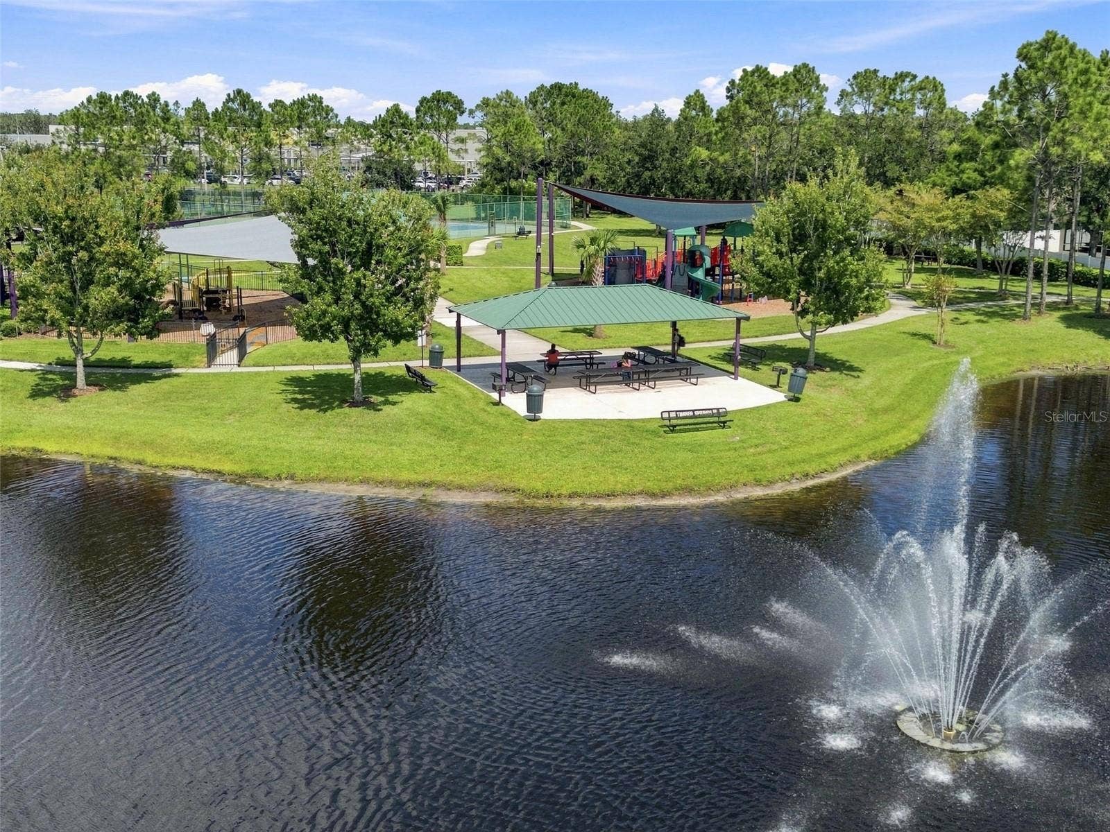 1174 BEECH GROVE WAY, Orlando, FL 32828 Ariel View of Pond and Playgrounds