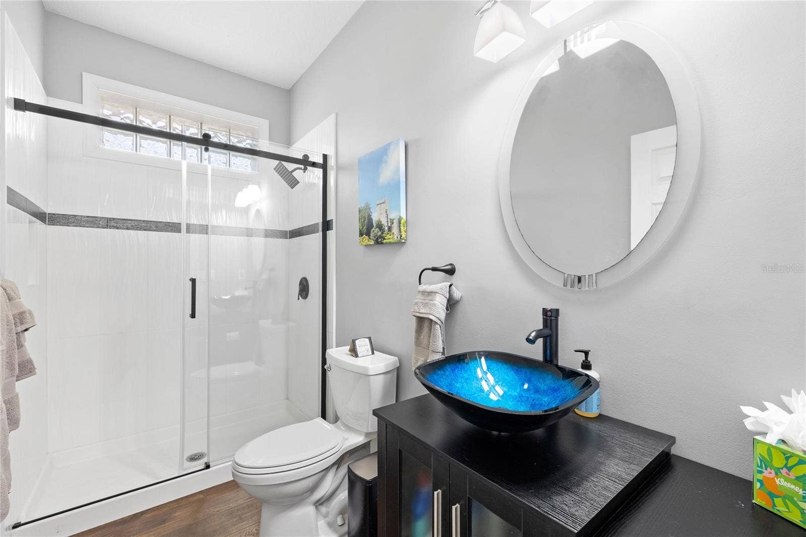 12901 PHILLIPS ROAD, Groveland, FL 34736 full bathroom downstairs with walk in shower