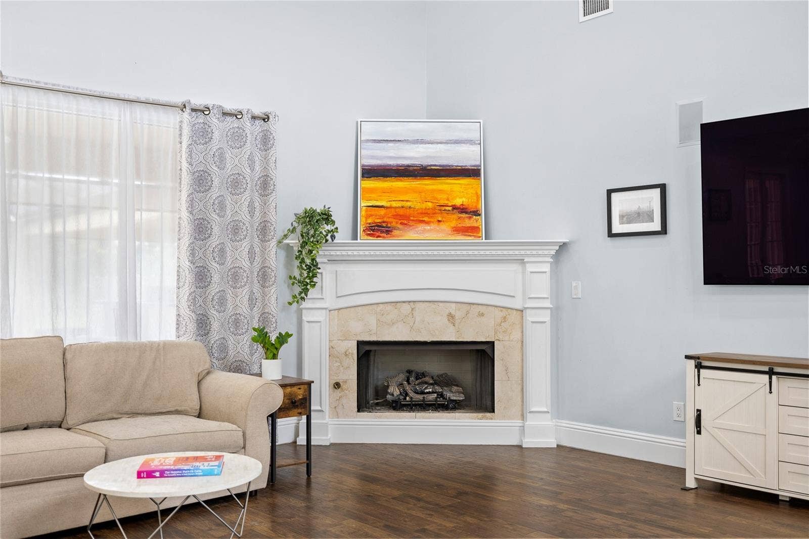 12901 PHILLIPS ROAD, Groveland, FL 34736 living room gas fireplace (propane)