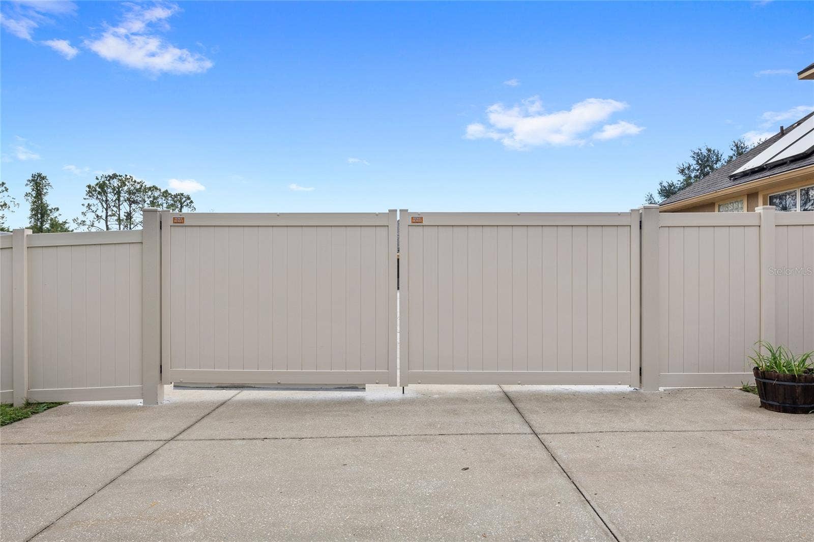 12901 PHILLIPS ROAD, Groveland, FL 34736 double door fence to backyard
