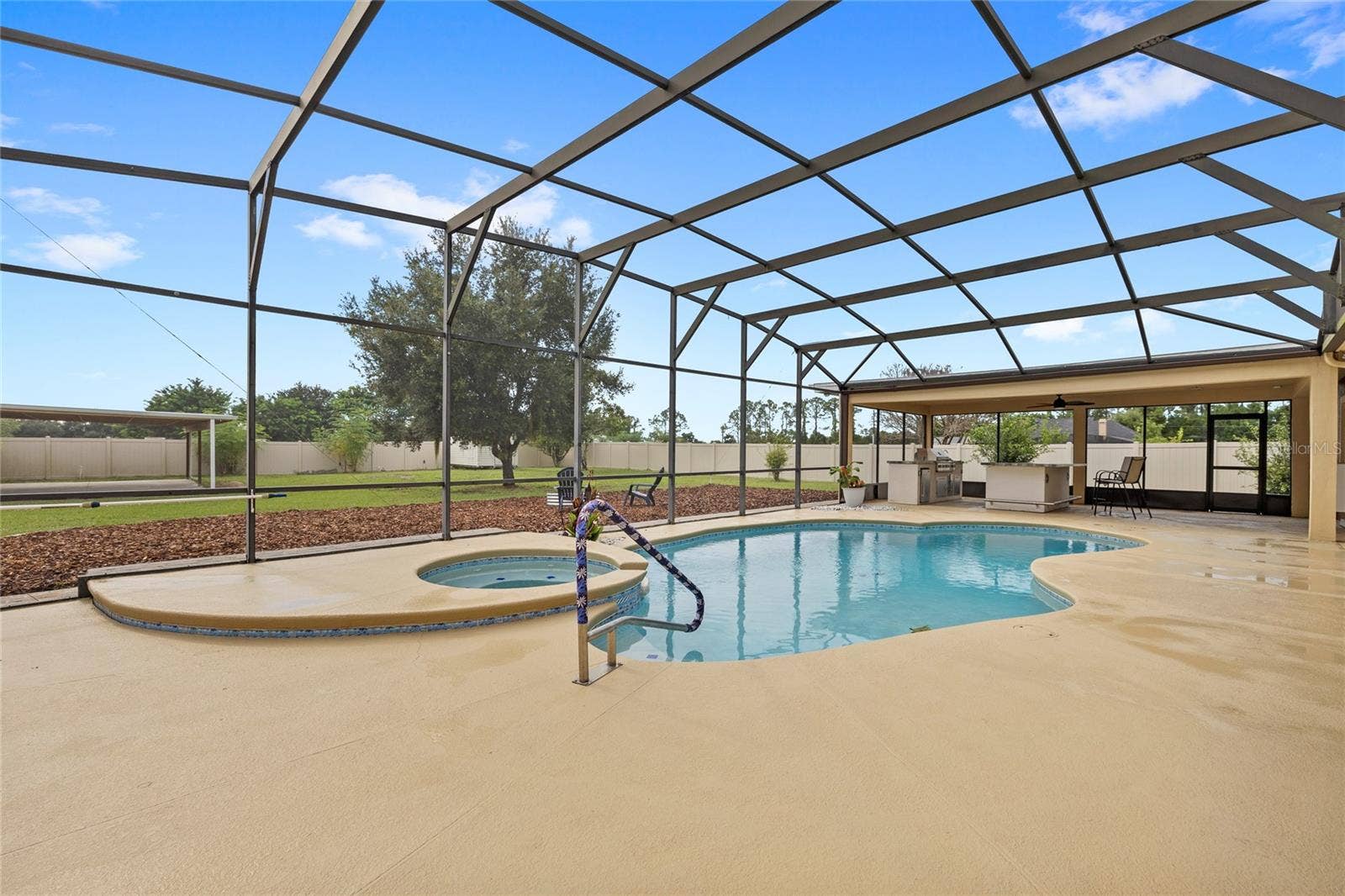 12901 PHILLIPS ROAD, Groveland, FL 34736 Solar heated pool and spa