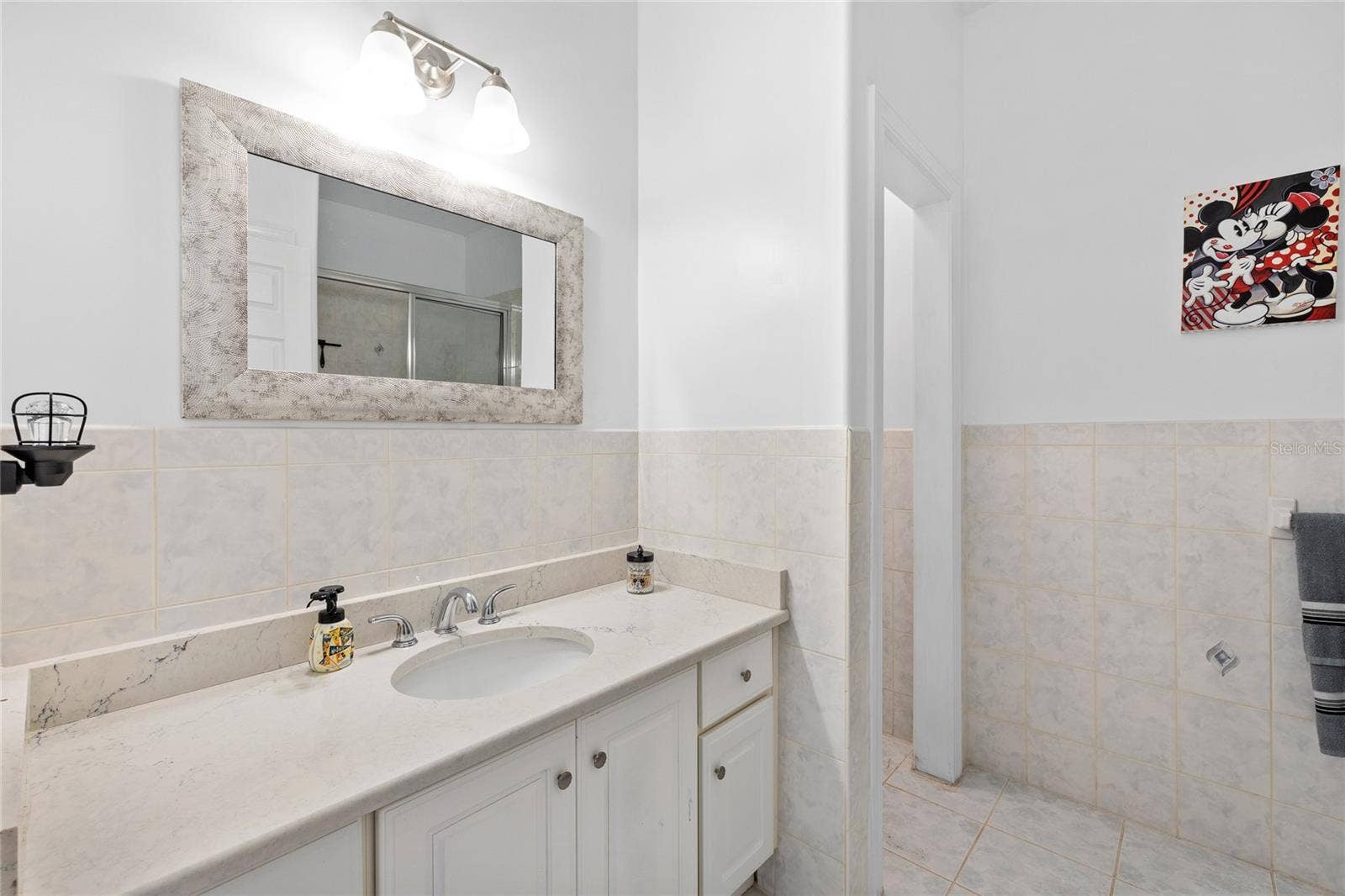 12901 PHILLIPS ROAD, Groveland, FL 34736 full bathroom number four in upstairs hallway serving bedrooms four and five