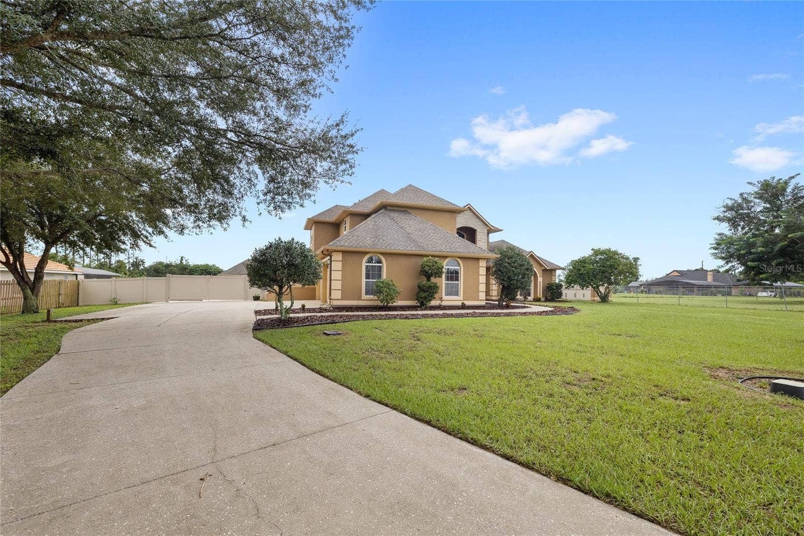 12901 PHILLIPS ROAD, Groveland, FL 34736 long driveway