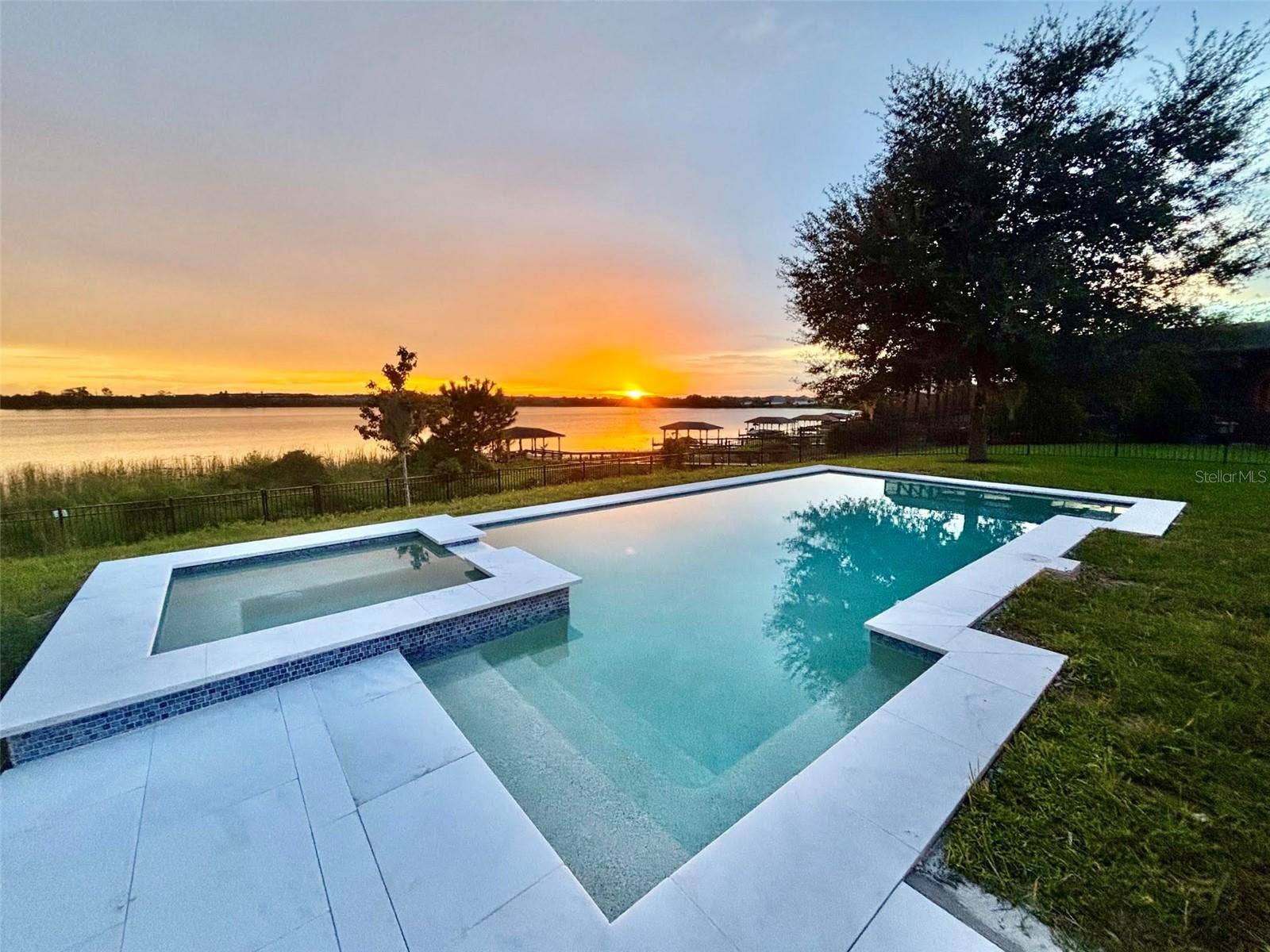 14048 LARKSPUR LAKE DRIVE, Winter Garden, FL 34787 14048 Larkspur Lake Dr - Updated private pool and spa with sunset views over Huckleberry Lake.