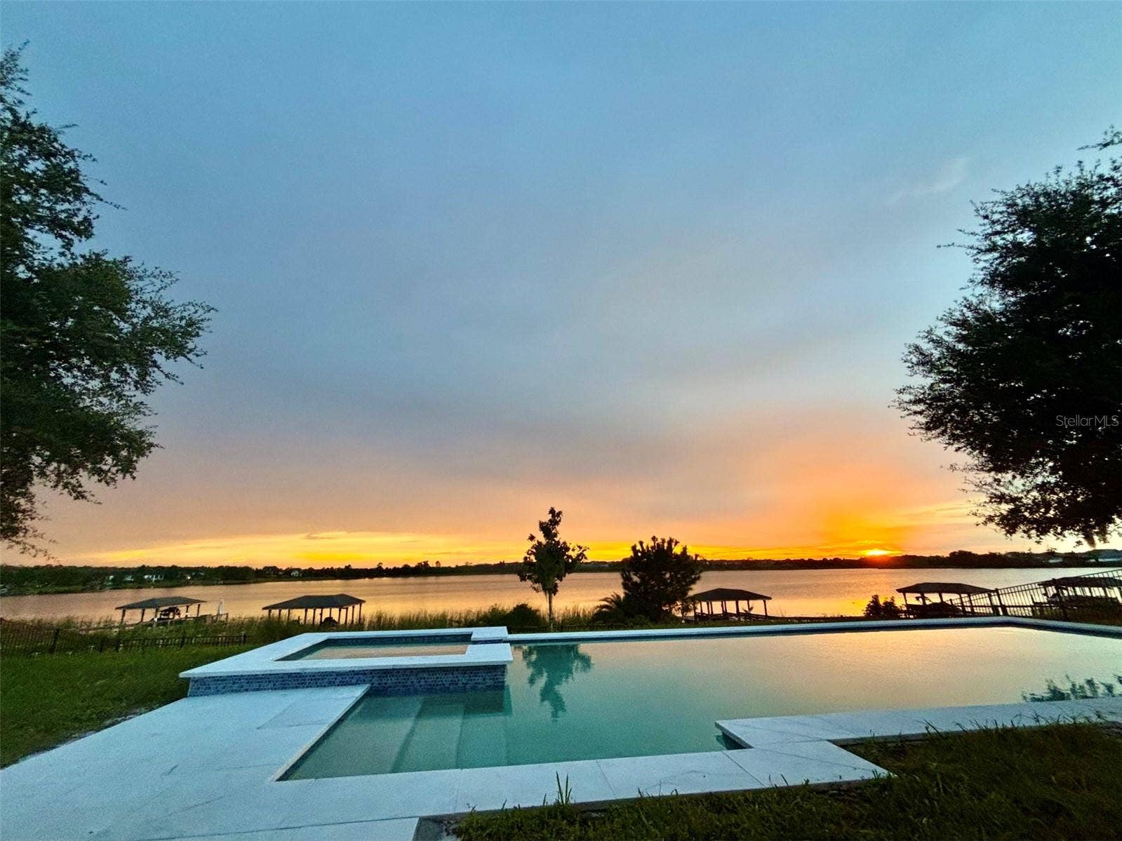 14048 LARKSPUR LAKE DRIVE, Winter Garden, FL 34787 14048 Larkspur Lake Dr - Enjoy beautiful sunsets overlooking the lake from the comfort of your home.