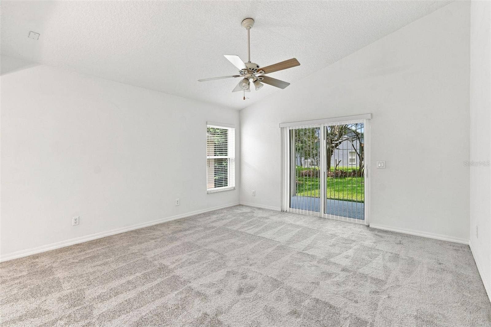 1151 BEECH GROVE WAY, Orlando, FL 32828 Family Room with Volume Ceilings and Fan