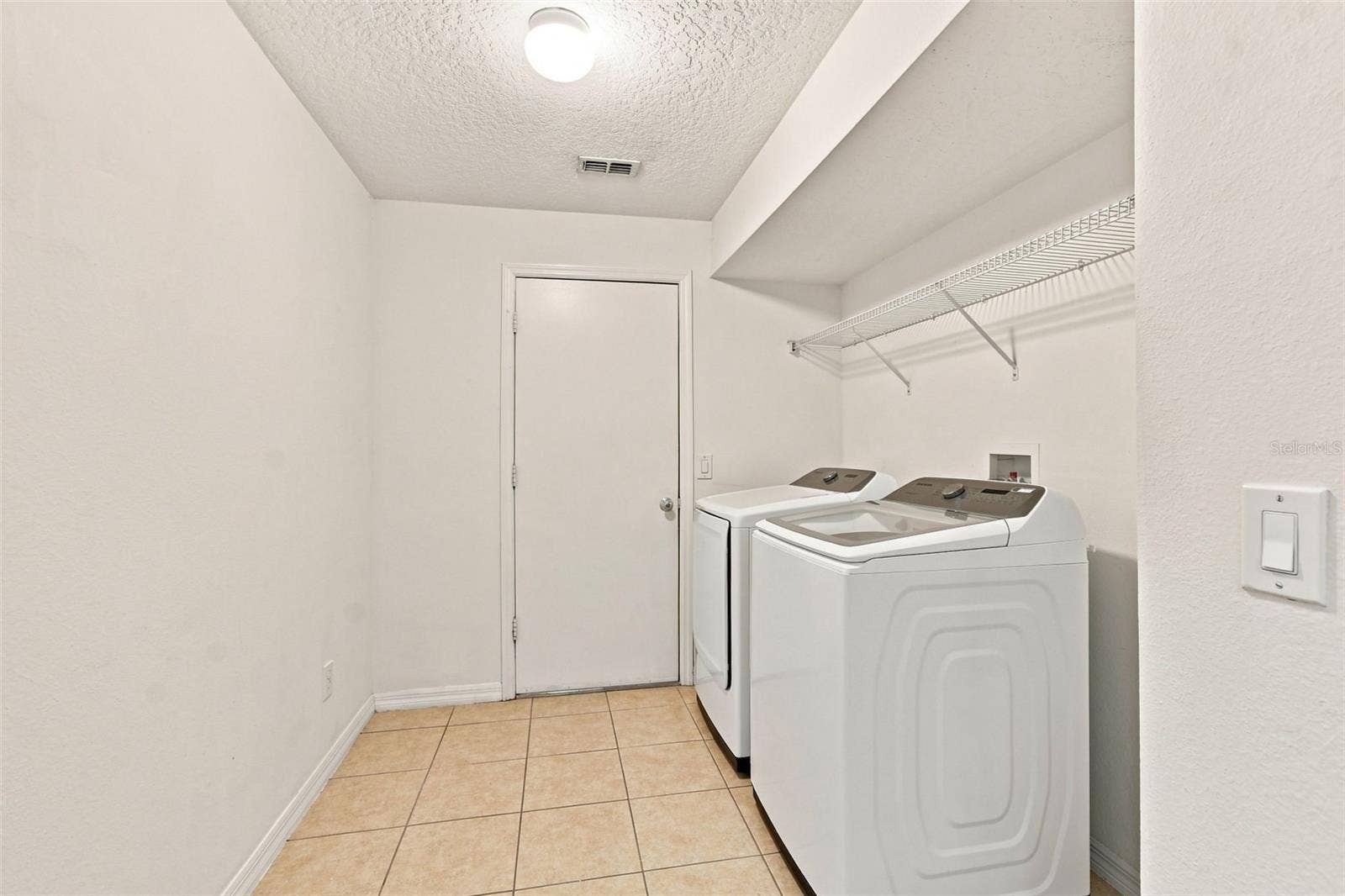 1151 BEECH GROVE WAY, Orlando, FL 32828 Interior Laundry Room with Washer and Dryer