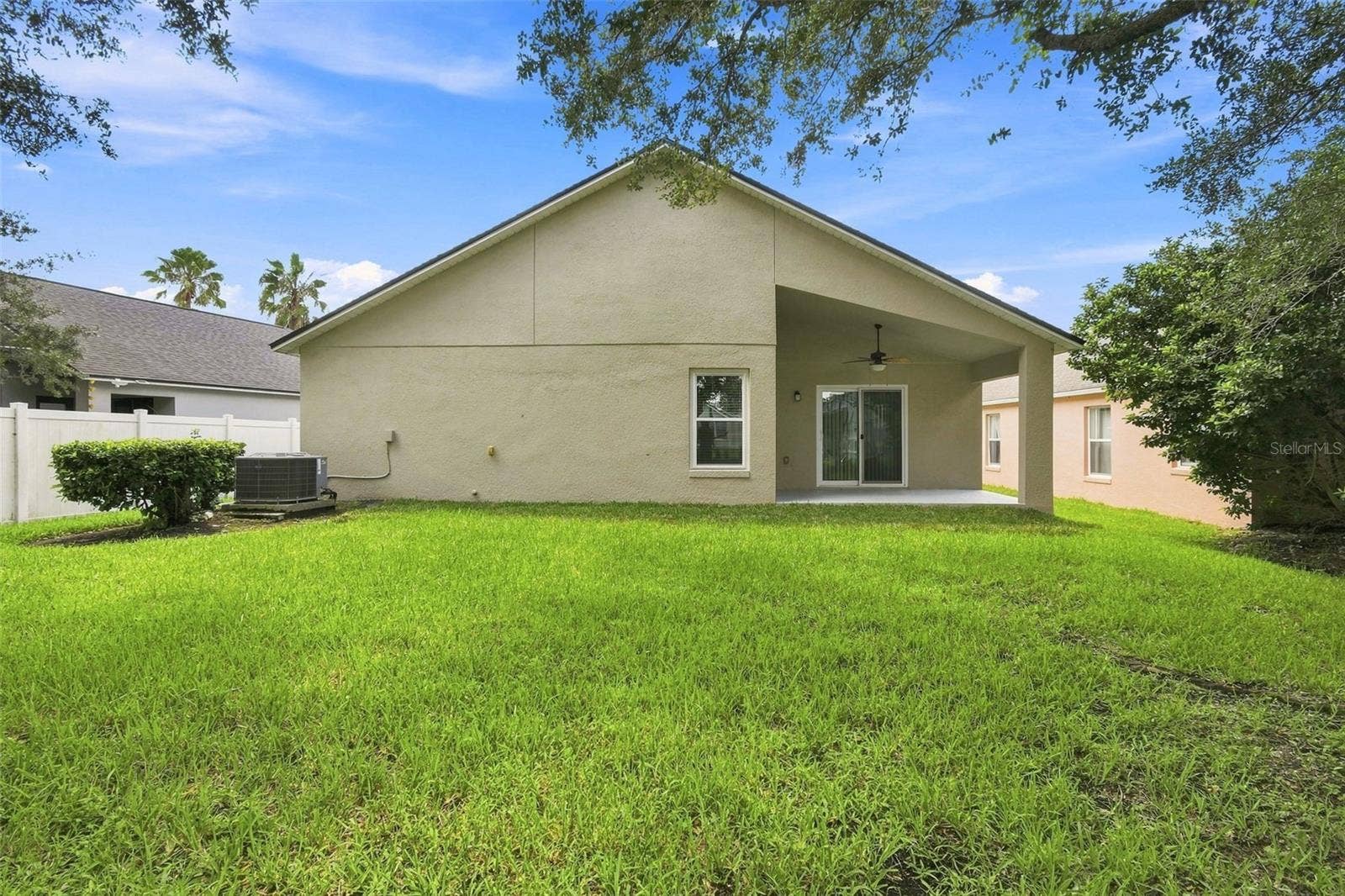 1151 BEECH GROVE WAY, Orlando, FL 32828 Exterior of Back of Home