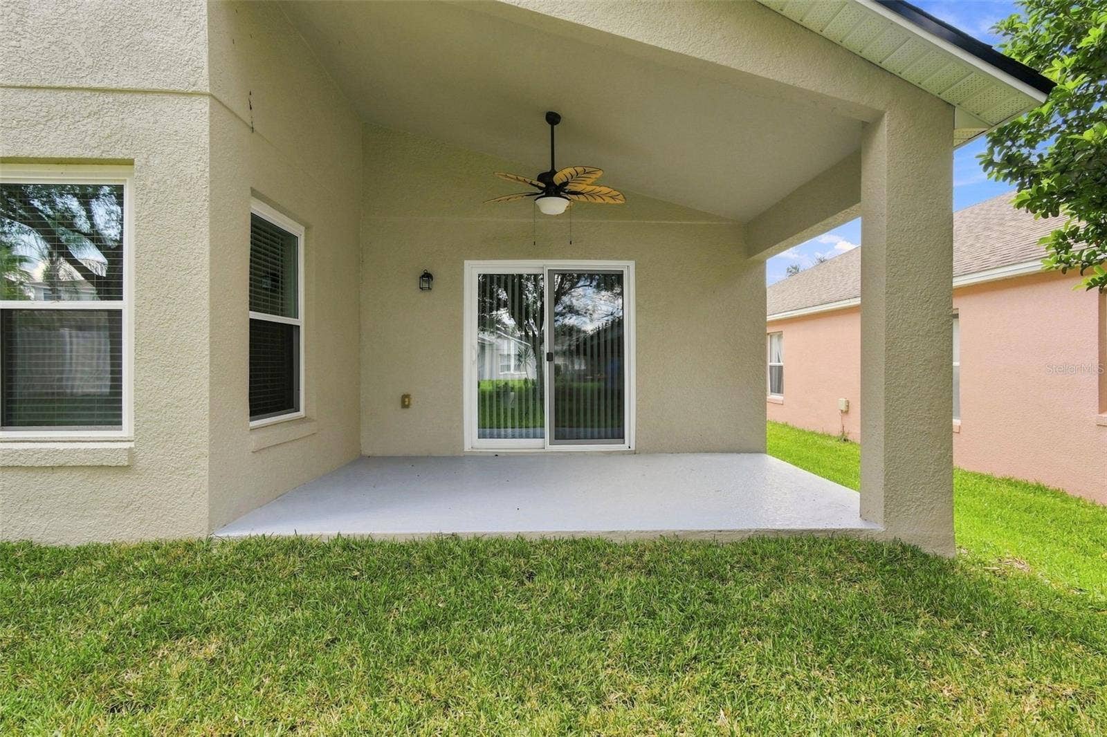 1151 BEECH GROVE WAY, Orlando, FL 32828 Covered Lanai with Ceiling Fan