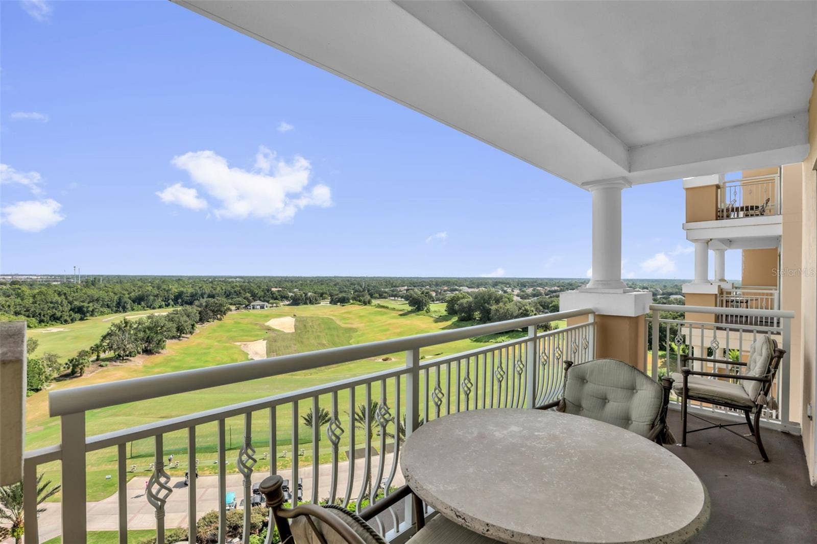 7593 GATHERING DRIVE, #707, Reunion, FL 34747 View from Balcony Overlooking Driving Range