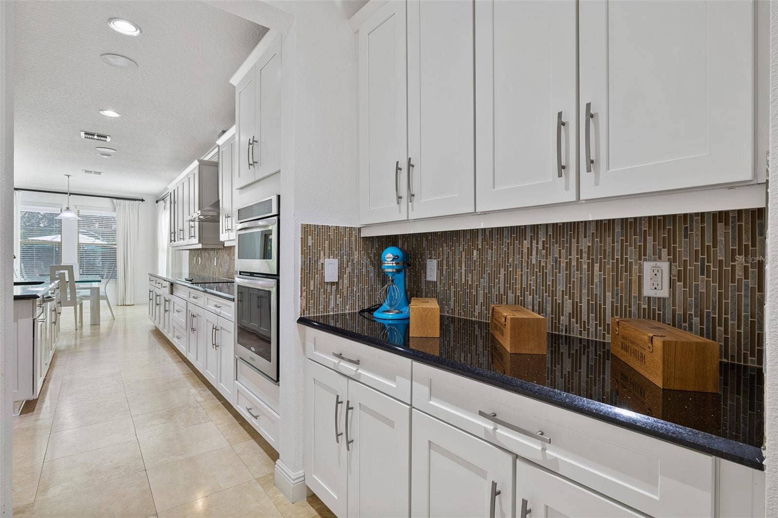Travertine floor, Granite countertop