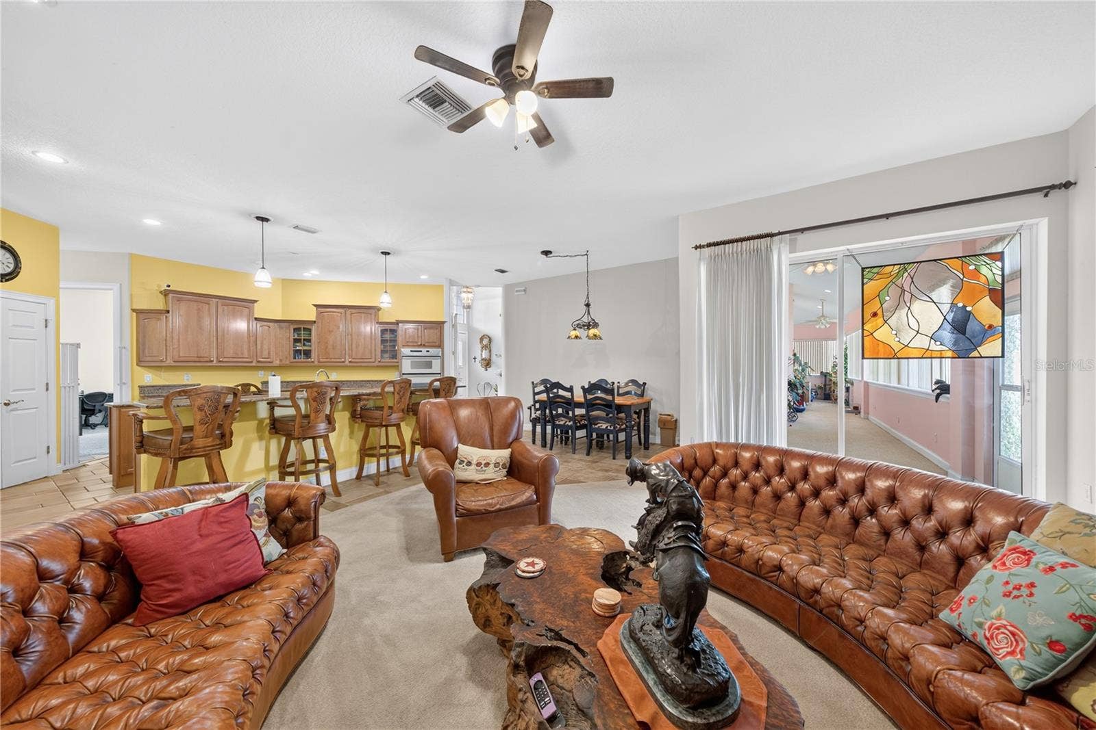 2335 FOREST CLUB DRIVE, Orlando, FL 32804 Kitchen has bar seating and ample room for casual dining.