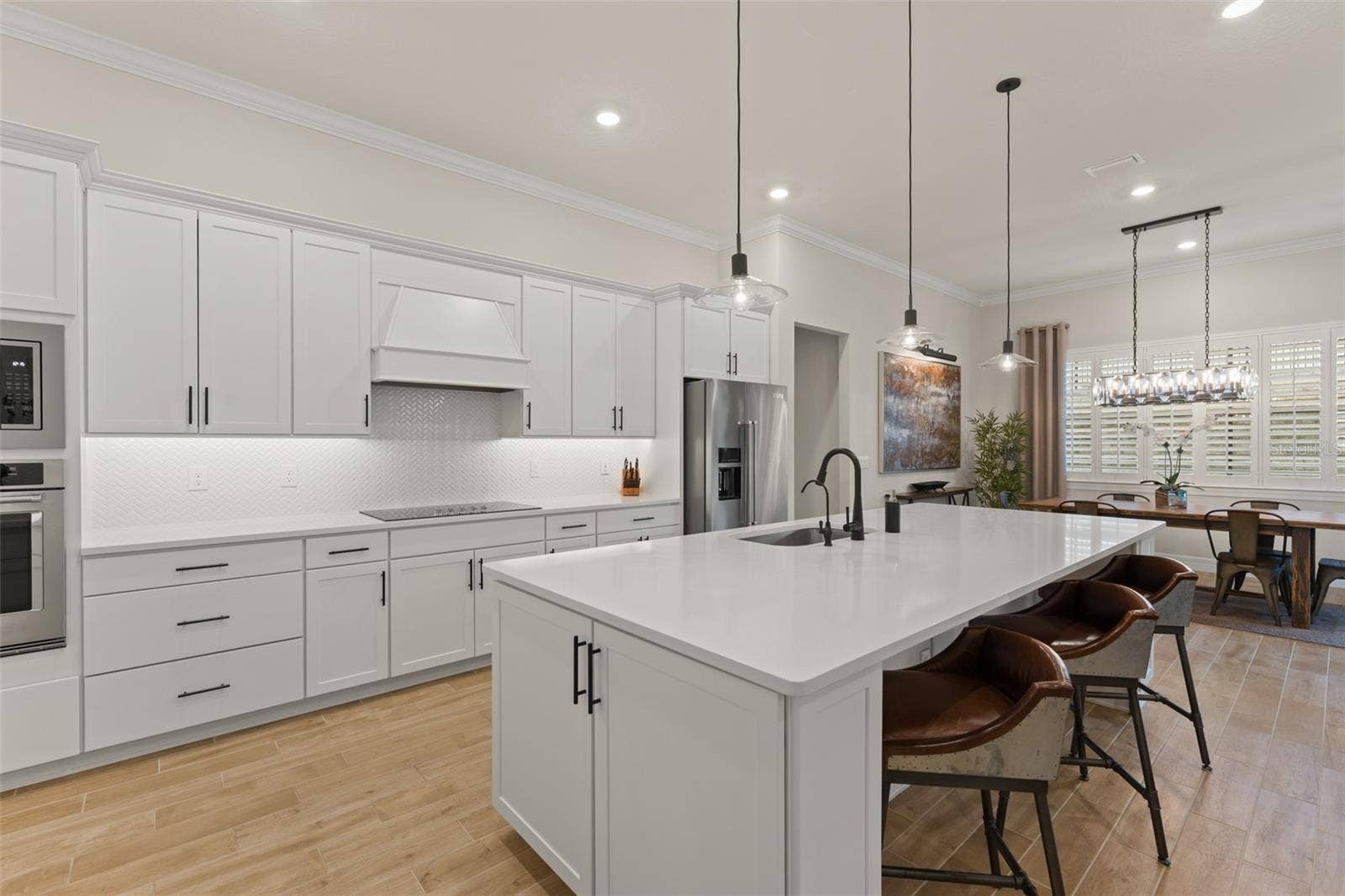 3292 WINDBEAM COURT, Winter Garden, FL 34787 Statuario quartz, and 42" soft-close cabinets.