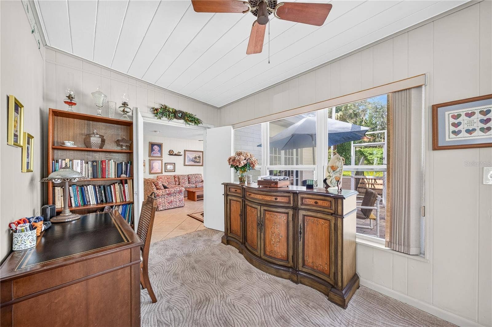 Florida room with office area.