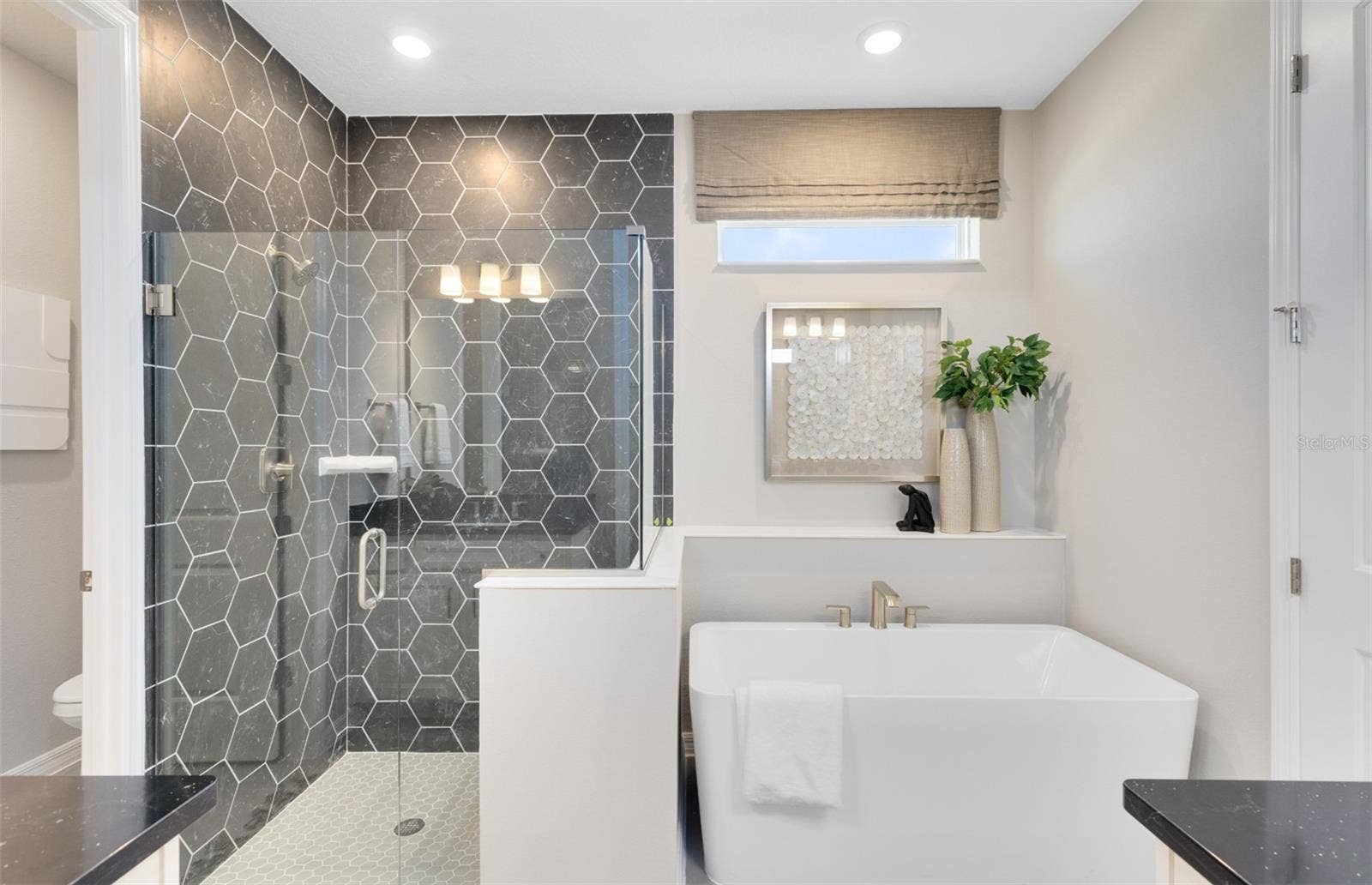 1430 RIDGE TREE DRIVE, Ormond Beach, FL 32174 Model Home Design Only. Pictures and furnishings are for illustrative purposes only. Elevations, colors and options may vary. Furniture is for model home staging only.