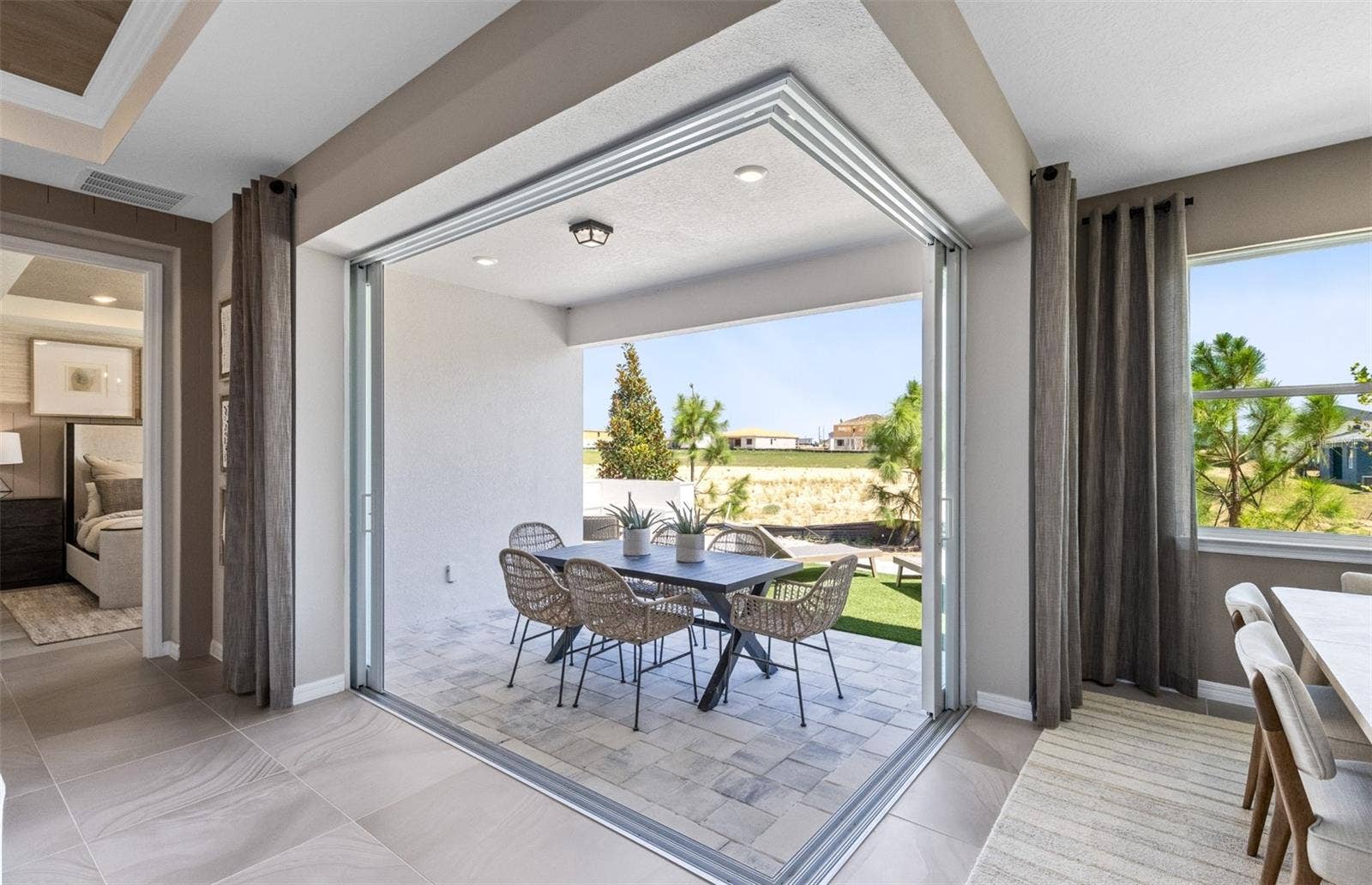 1430 RIDGE TREE DRIVE, Ormond Beach, FL 32174 Model Home Design Only. Pictures and furnishings are for illustrative purposes only. Elevations, colors and options may vary. Furniture is for model home staging only.