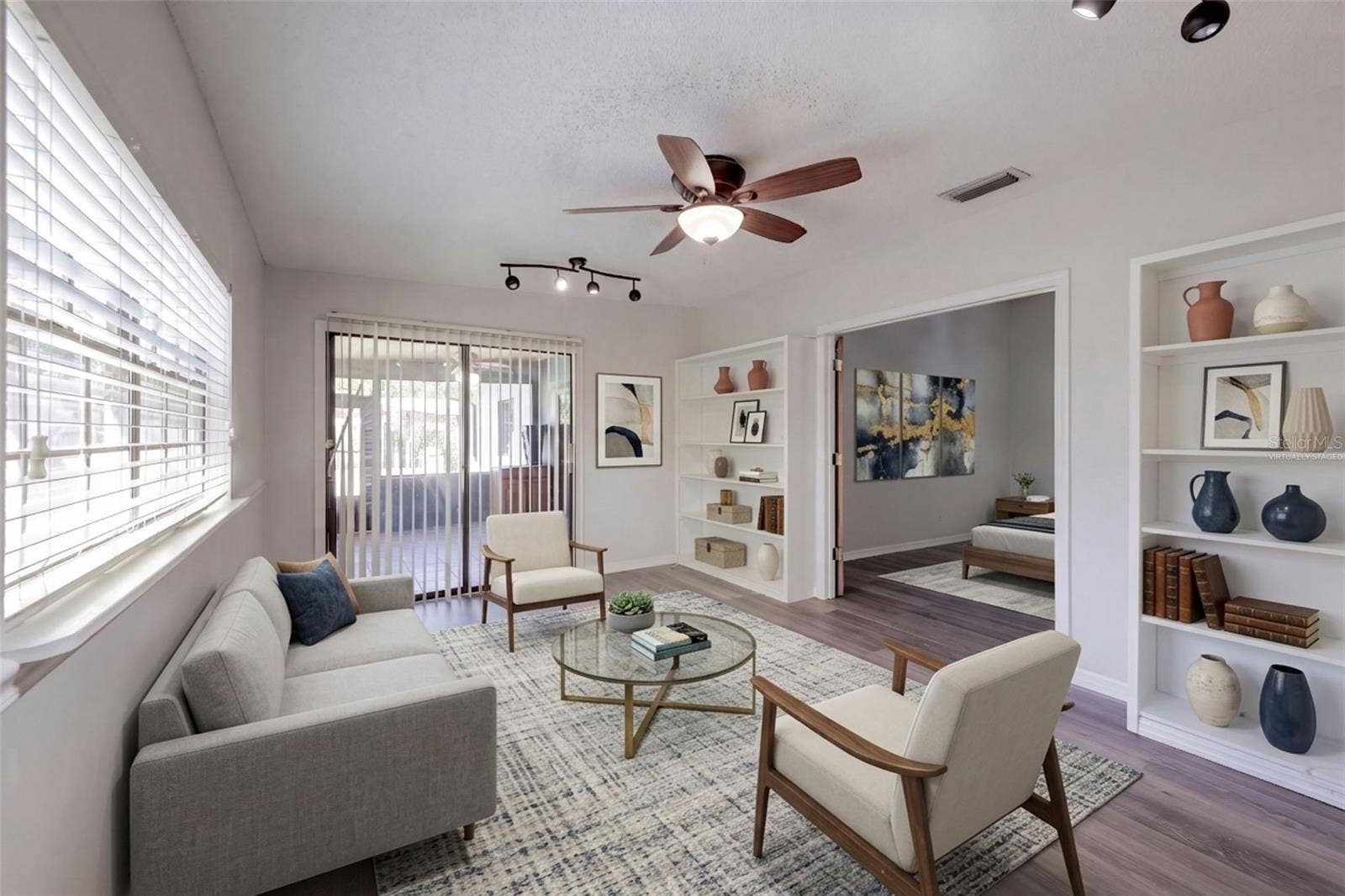 954 NIBLICK DRIVE, Casselberry, FL 32707 Florida room off master bedroom - virtually staged as a sitting area.