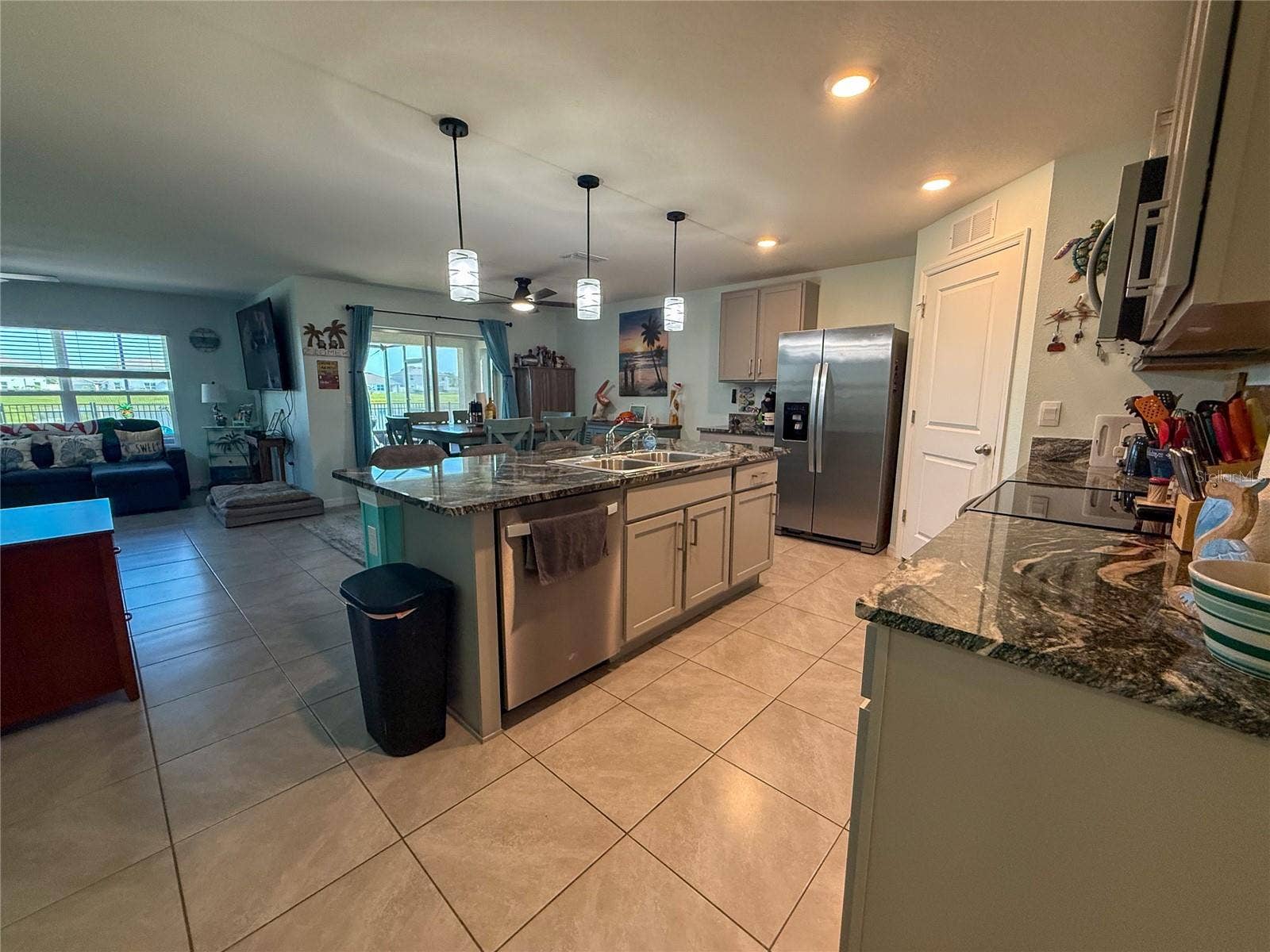 4120 QUIET RAIN COURT, Palmetto, FL 34221 KITCHEN WITH VIEW OF LIVING ROOM