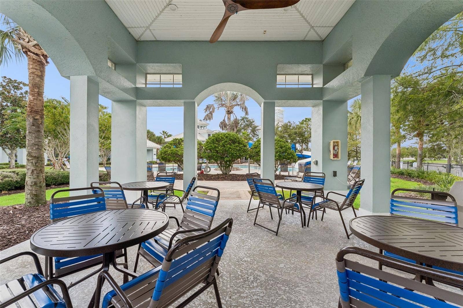 589 BLUE CYPRESS DRIVE, Groveland, FL 34736 Covered Outdoor seating around the pool