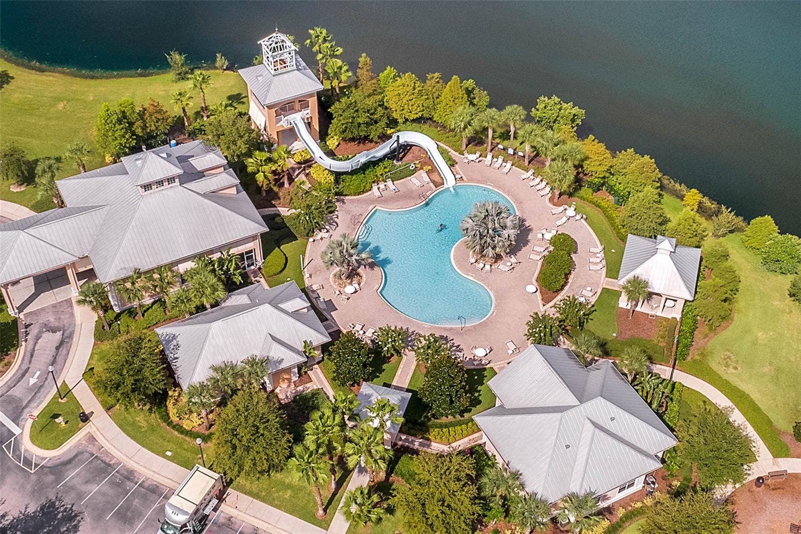 589 BLUE CYPRESS DRIVE, Groveland, FL 34736 Clubhouse, Pool, Gym, Tennis, Pickle ball, and Playground amenities.