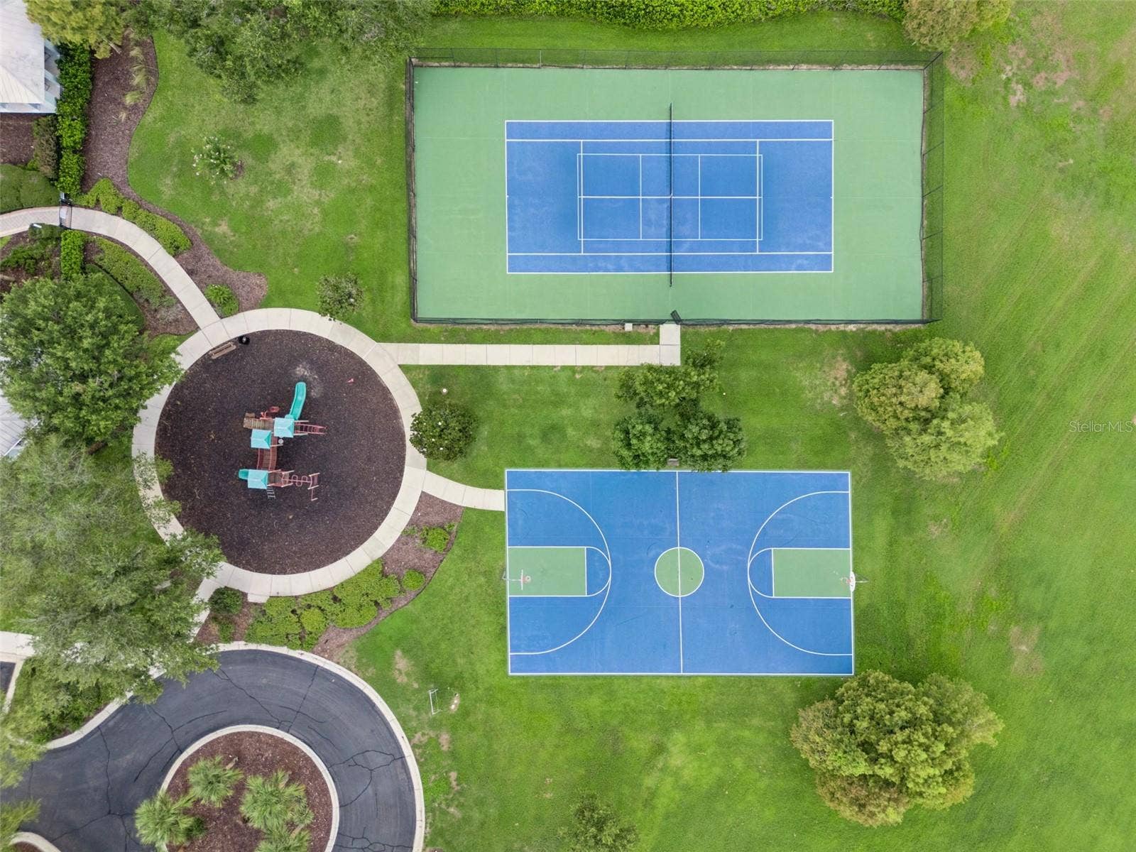 589 BLUE CYPRESS DRIVE, Groveland, FL 34736 Clubhouse, Pool, Gym, Tennis, Pickle ball, and Playground amenities.