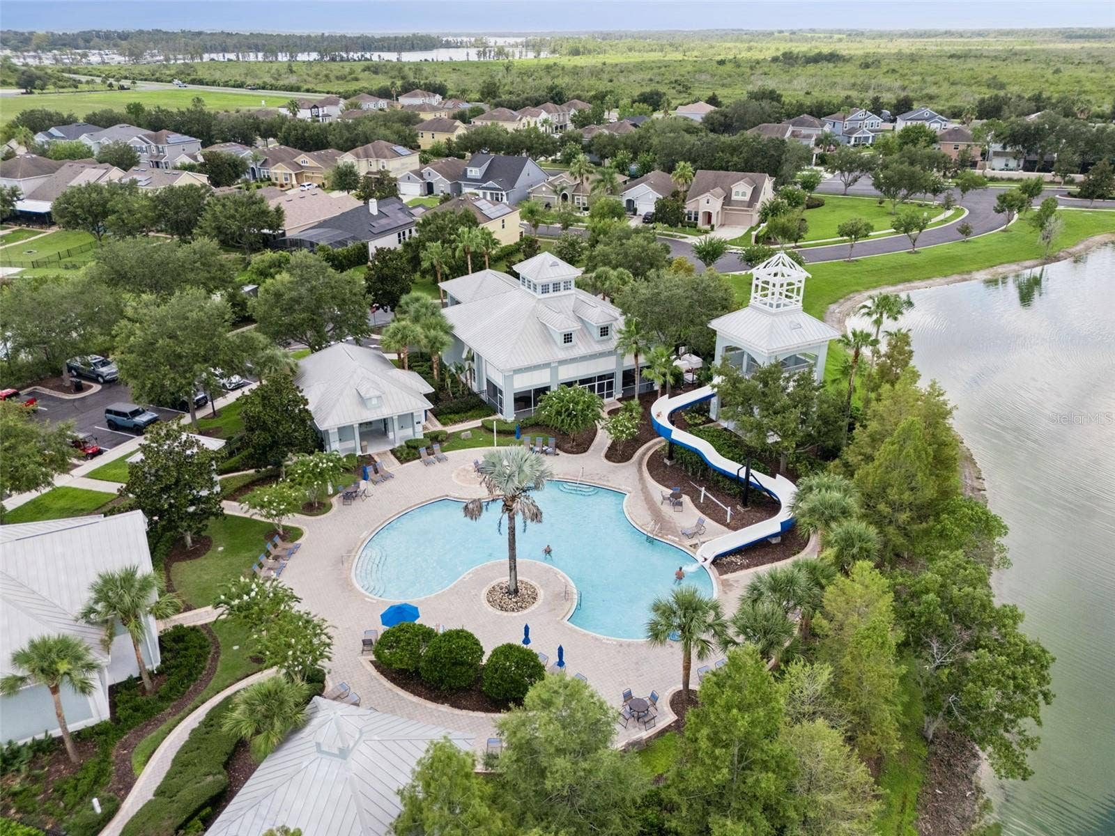 589 BLUE CYPRESS DRIVE, Groveland, FL 34736 Clubhouse, Pool, Gym, Tennis, Pickle ball, and Playground amenities.