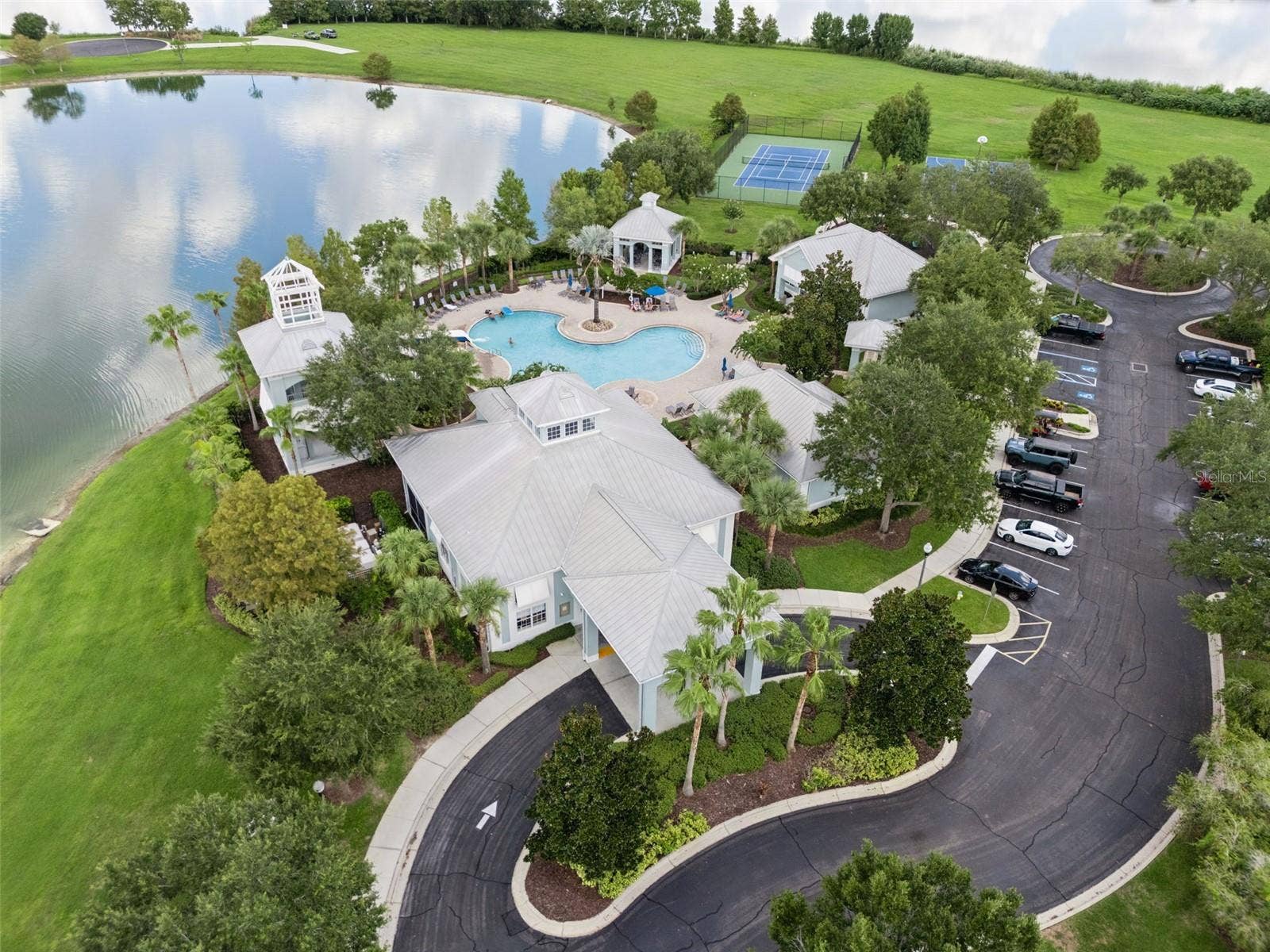 589 BLUE CYPRESS DRIVE, Groveland, FL 34736 Clubhouse, Pool, Gym, Tennis, Pickle ball, and Playground amenities.