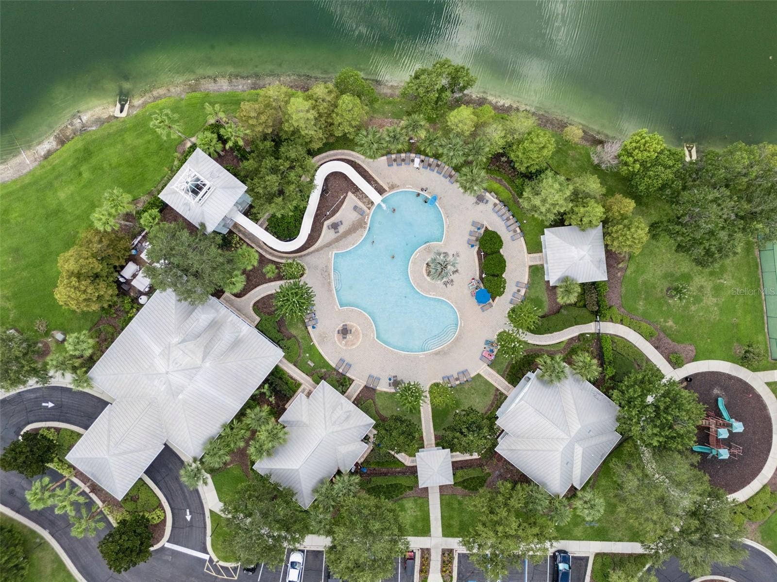 589 BLUE CYPRESS DRIVE, Groveland, FL 34736 Clubhouse, Pool, Gym, Tennis, Pickle ball, and Playground amenities.