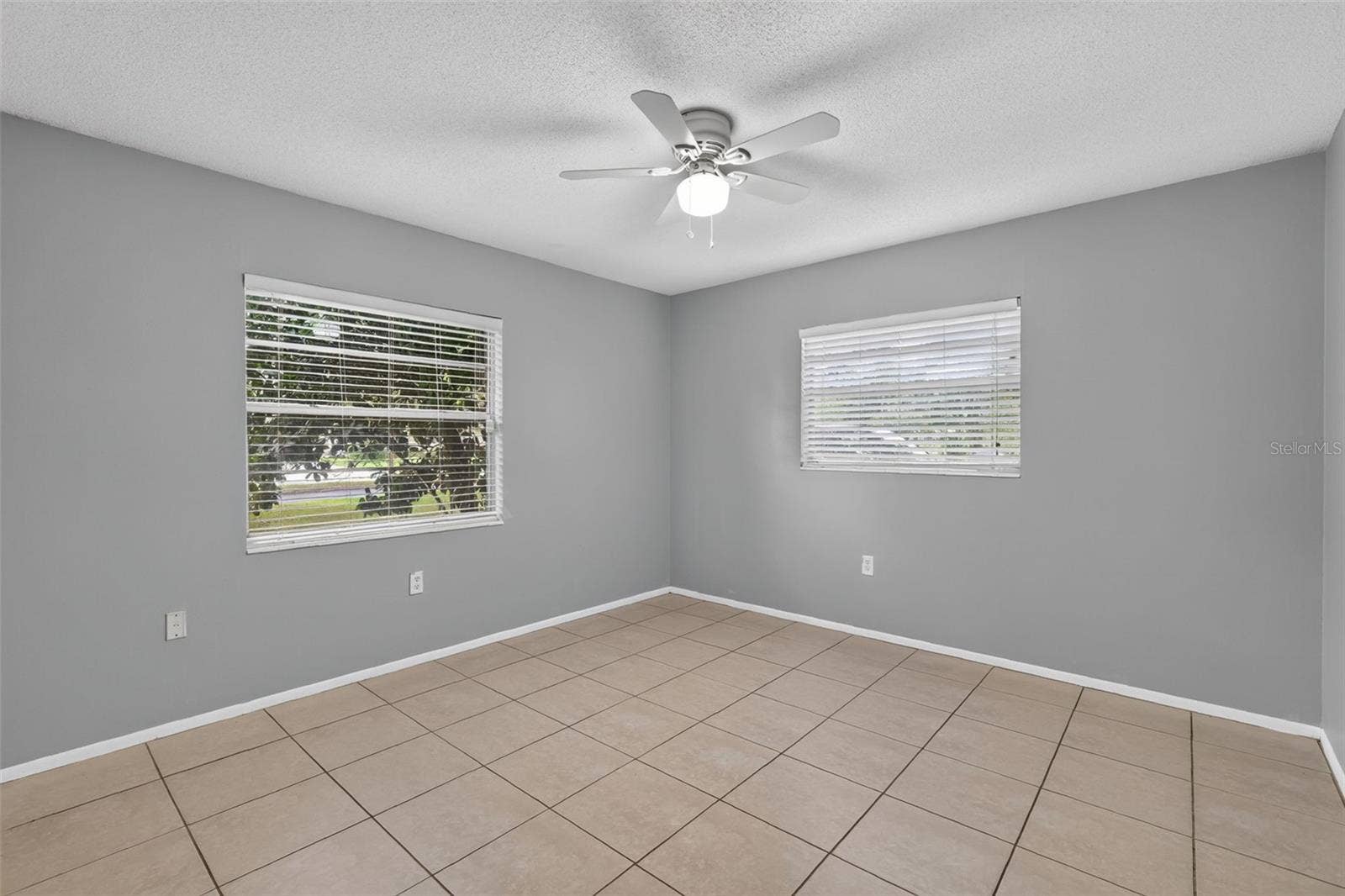 1305 ORANGE AVENUE, Tavares, FL 32778 Second Bedroom Offers Good Natural Light and Tile flooring
