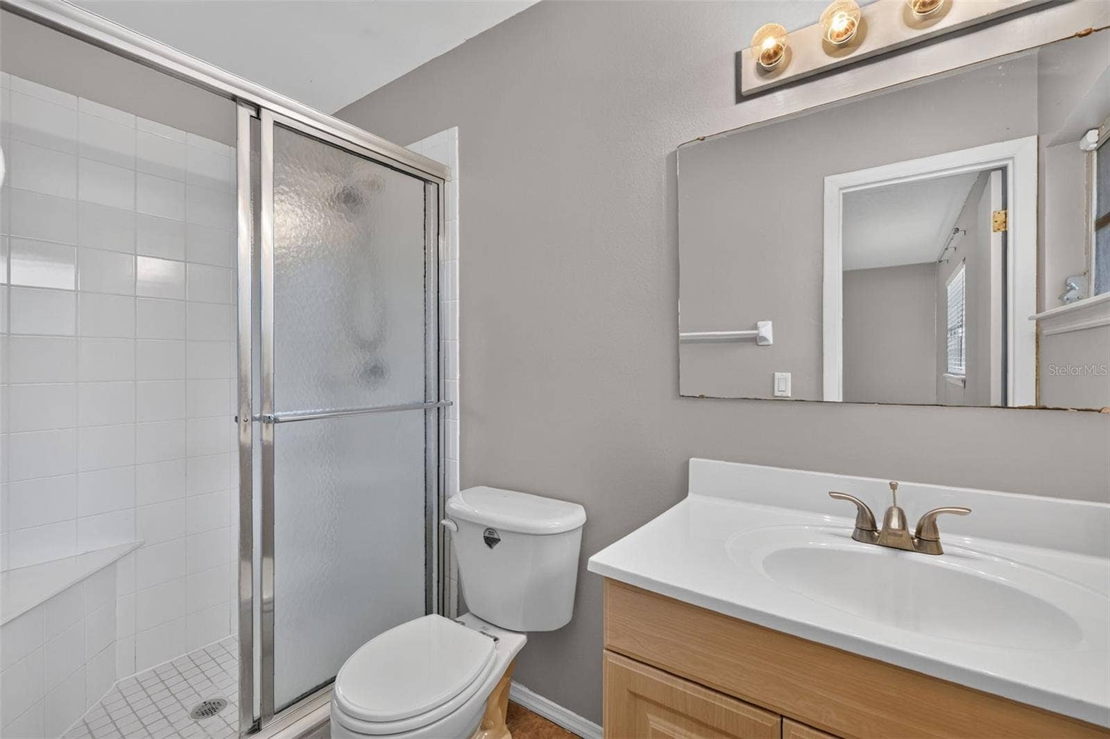 1305 ORANGE AVENUE, Tavares, FL 32778 Private Primary Bathroom with Walk-in shower