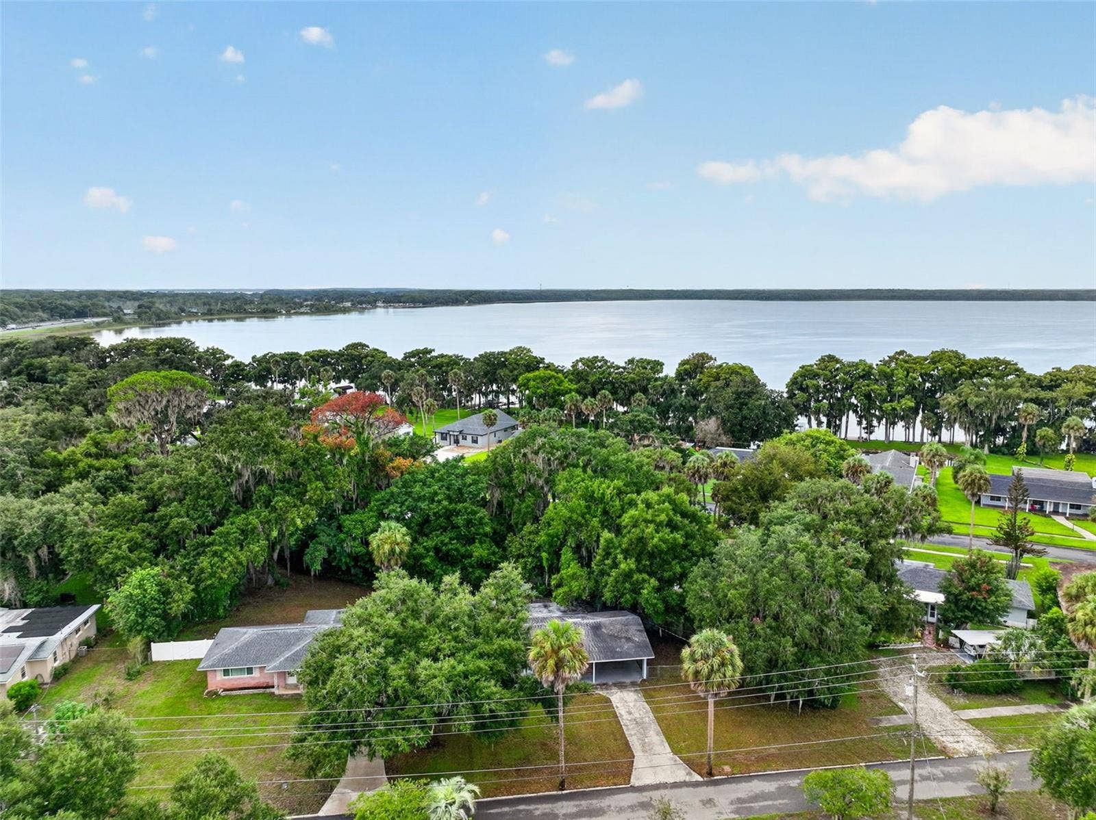 1305 ORANGE AVENUE, Tavares, FL 32778 Aerial View Highlighting the Home's Convenient Tavares Location near the Chain Of Lakes