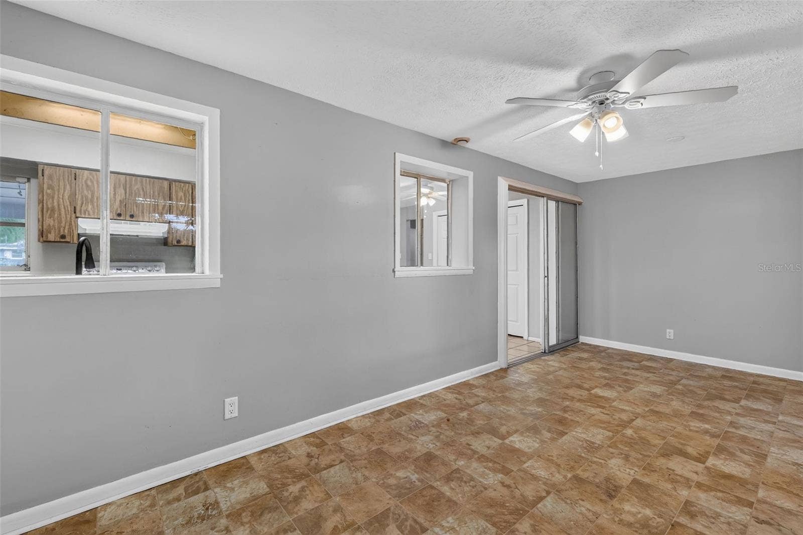 1305 ORANGE AVENUE, Tavares, FL 32778 Bonus/Florida Room Provides Desired Extra Living Space In the Home