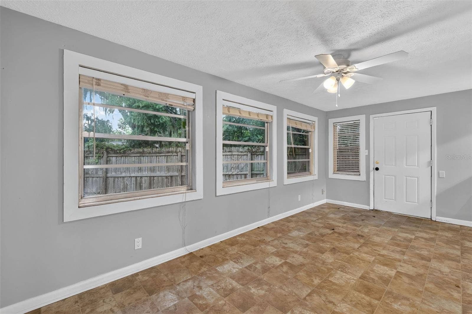 1305 ORANGE AVENUE, Tavares, FL 32778 Bonus/Florida Room Provides Direct Access To the Fenced Back Yard