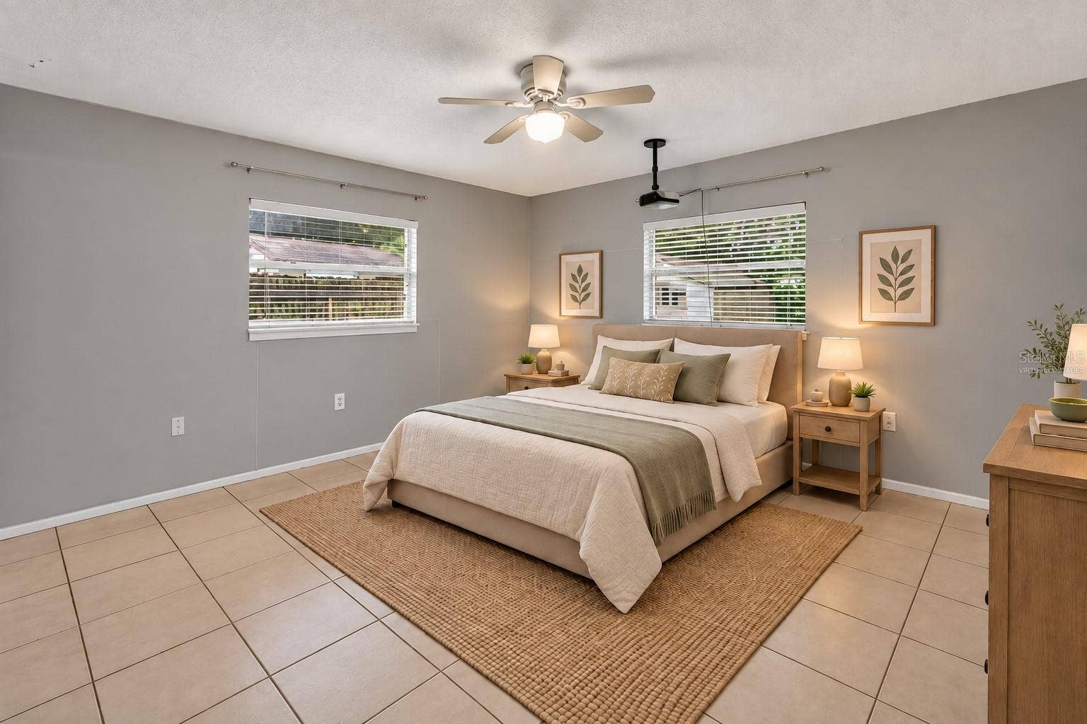 1305 ORANGE AVENUE, Tavares, FL 32778 VIRTUALLY STAGED Primary Bedroom Ensuite