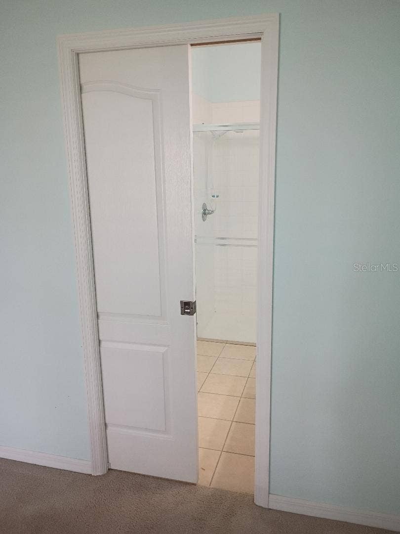 47 SUMMERWIND CIRCLE, #95, Palm Coast, FL 32137 Owners Bathroom Pocket Door