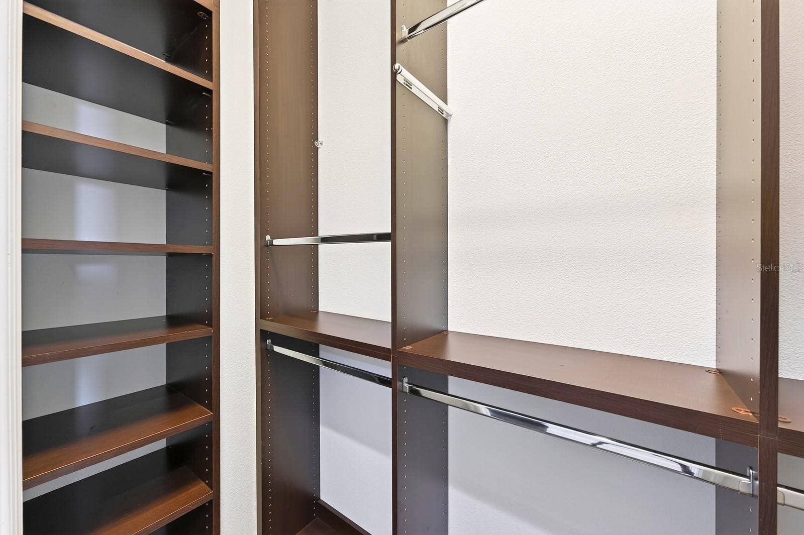 Custom storage in the dual walk-in closets.