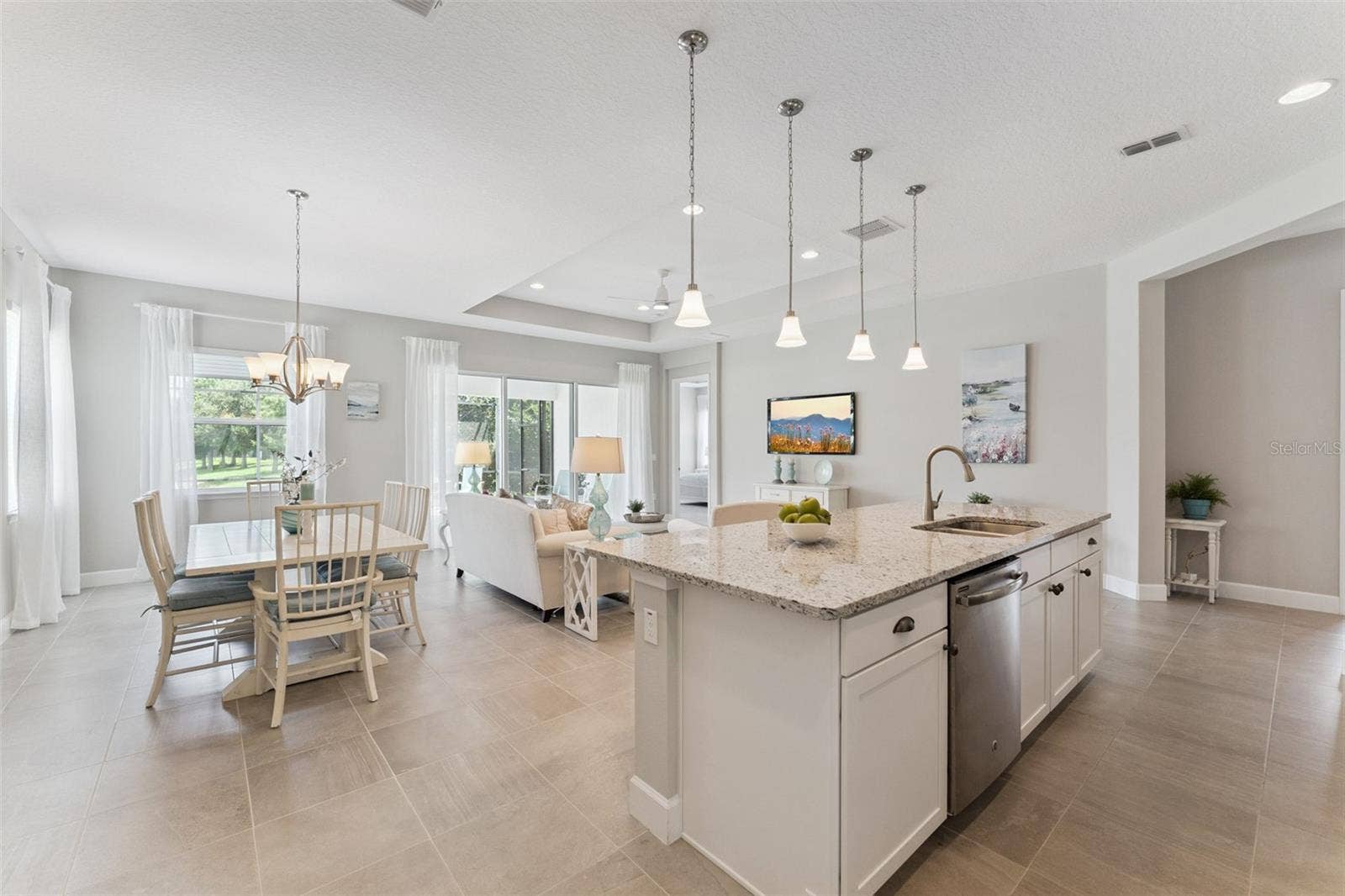 View of the Dining & Great Room areas from the Kitchen