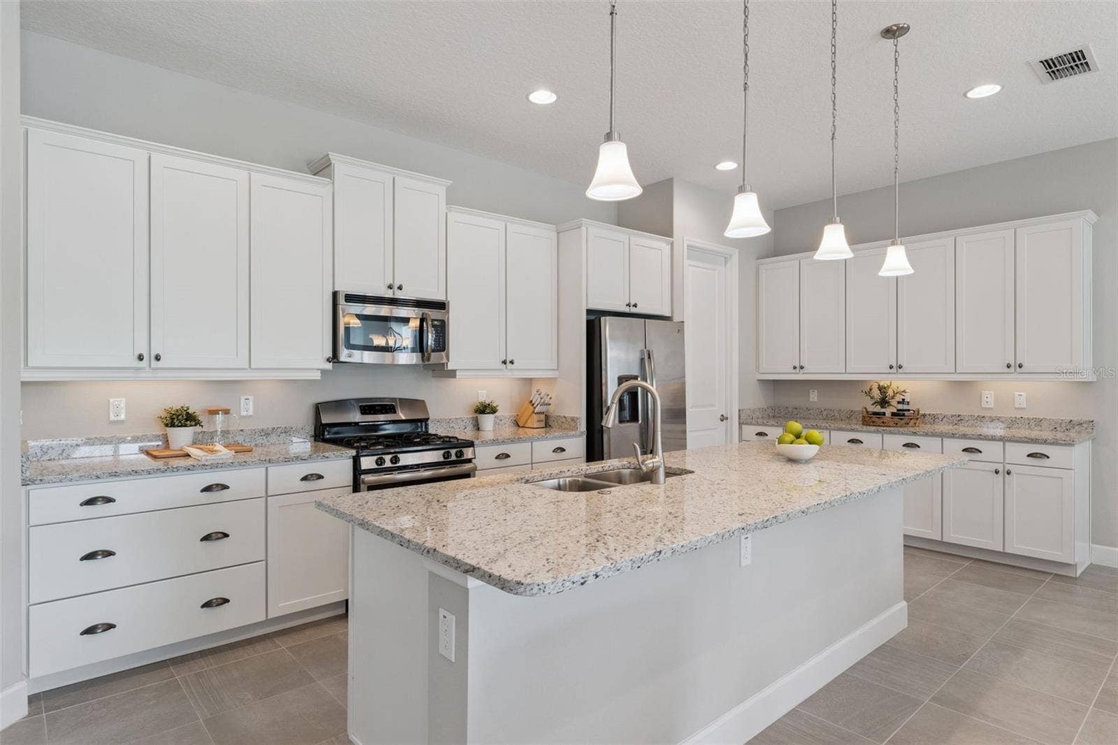 Kitchen w/ Pot & Pan drawers & cabinets w/ crown molding