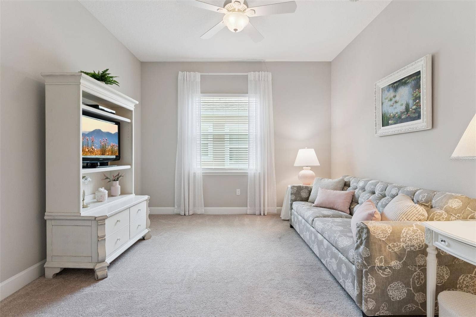 12'6" x 12' Den/Office w/ a ceiling fan