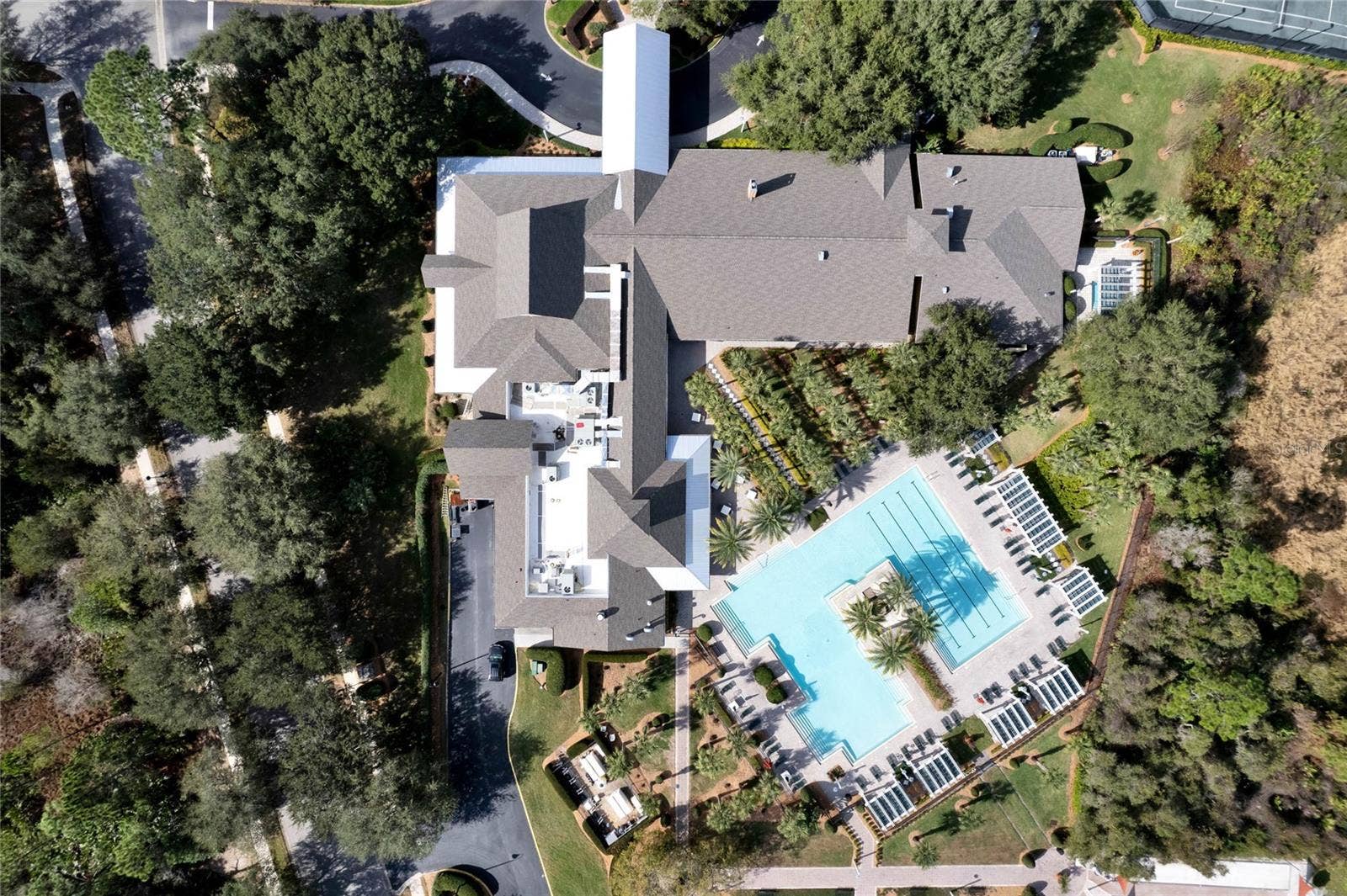 Aerial view of the Victoria Gardens clubhouse & resort style heated pool