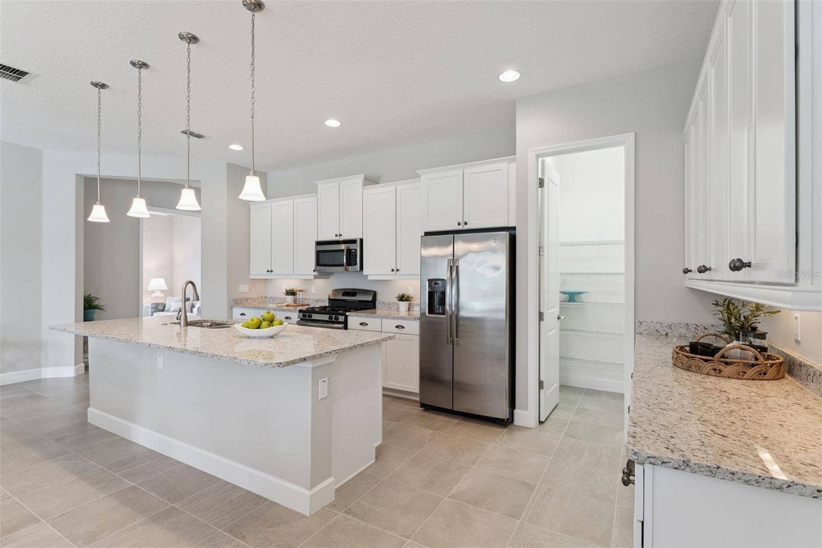 Kitchen has a spacious walk-in pantry