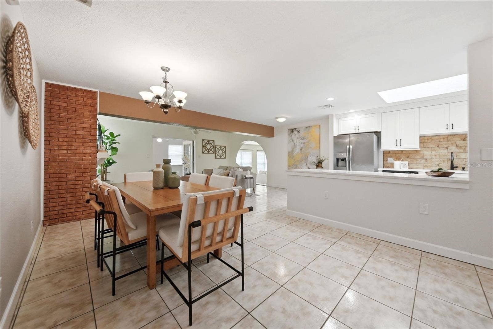 1540 E HORATIO AVENUE, Maitland, FL 32751 Formal dining room, living room, fireplace.