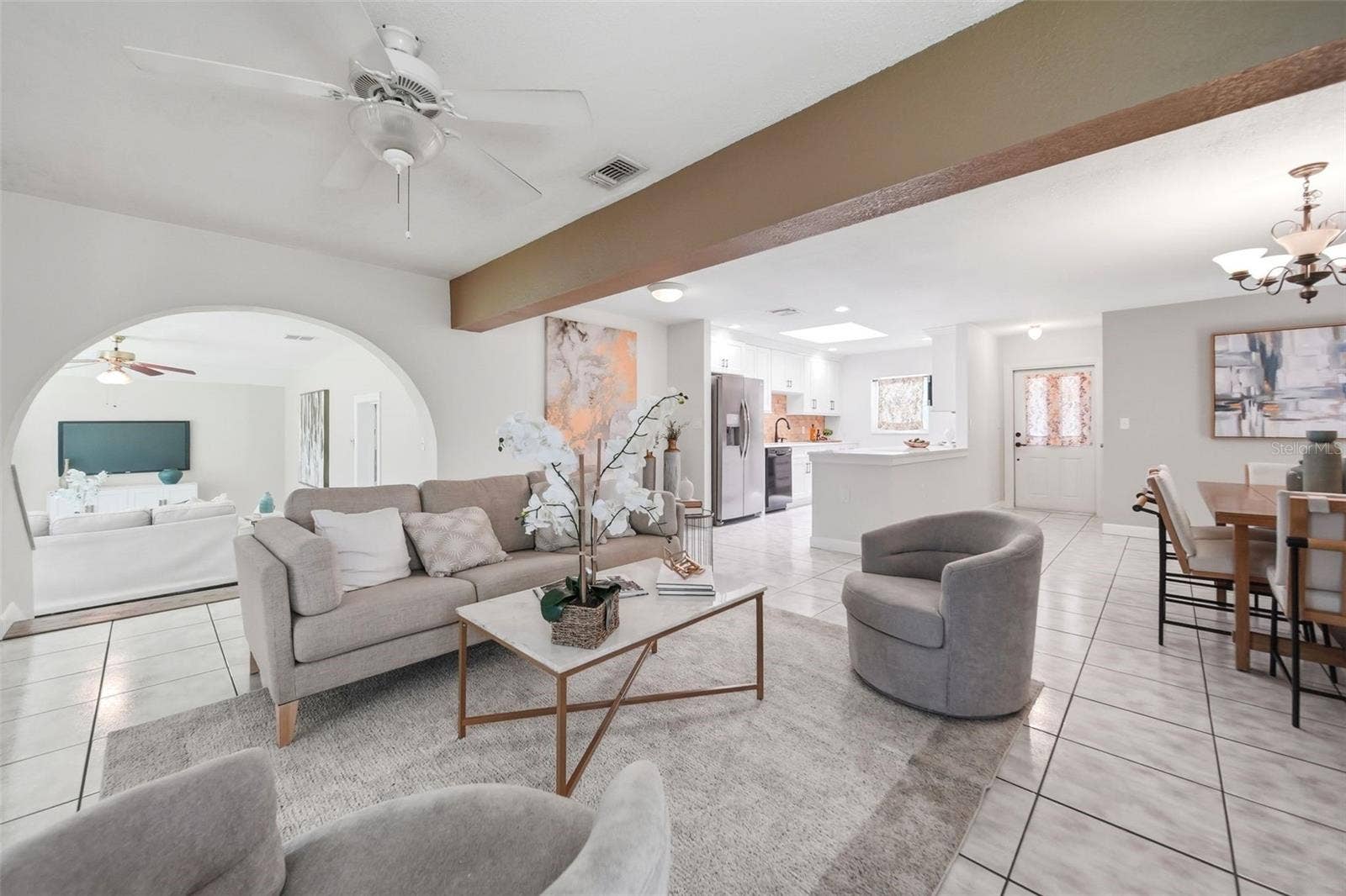 1540 E HORATIO AVENUE, Maitland, FL 32751 Living space into family room.